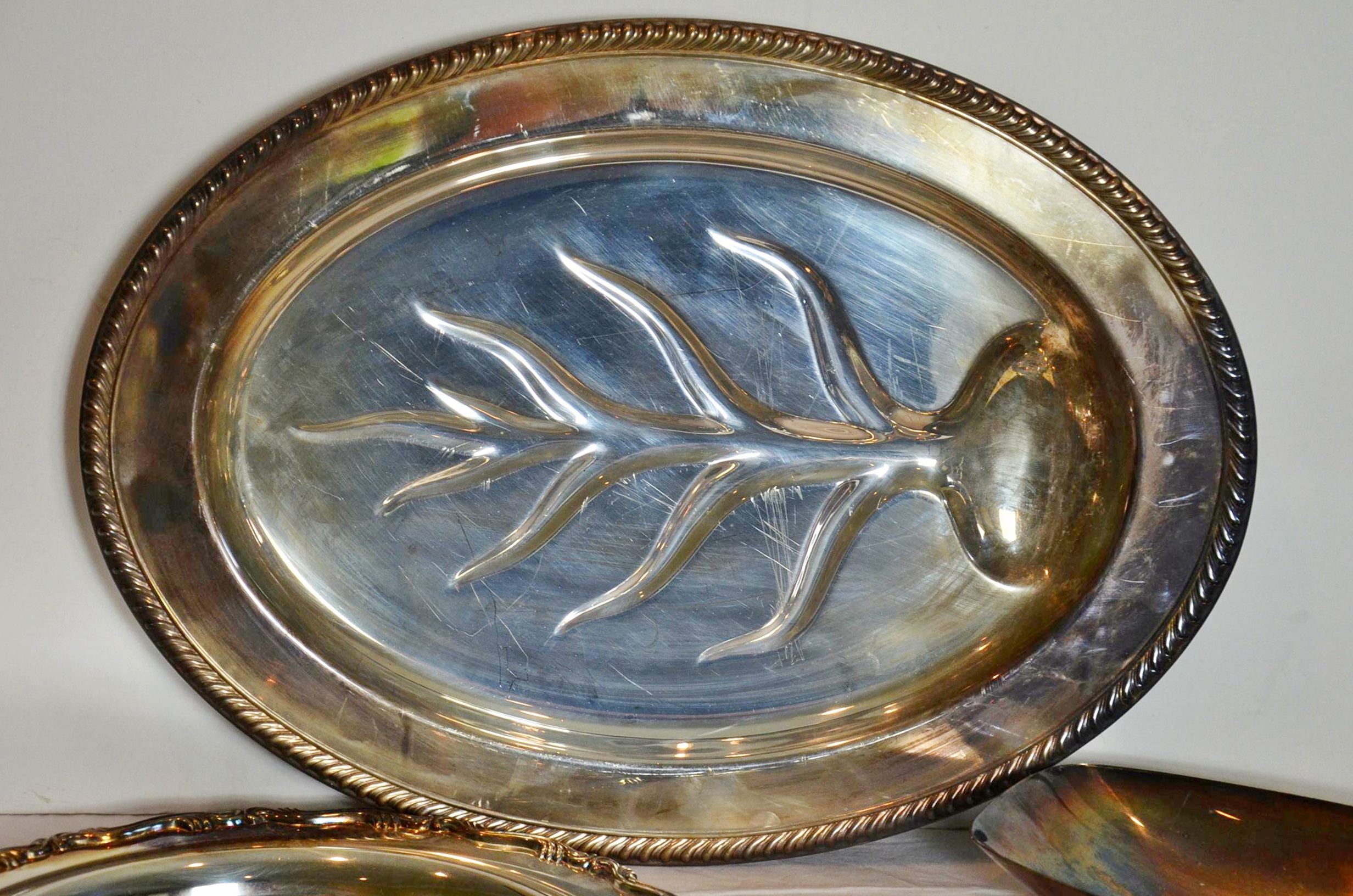 Silver plate serving items.