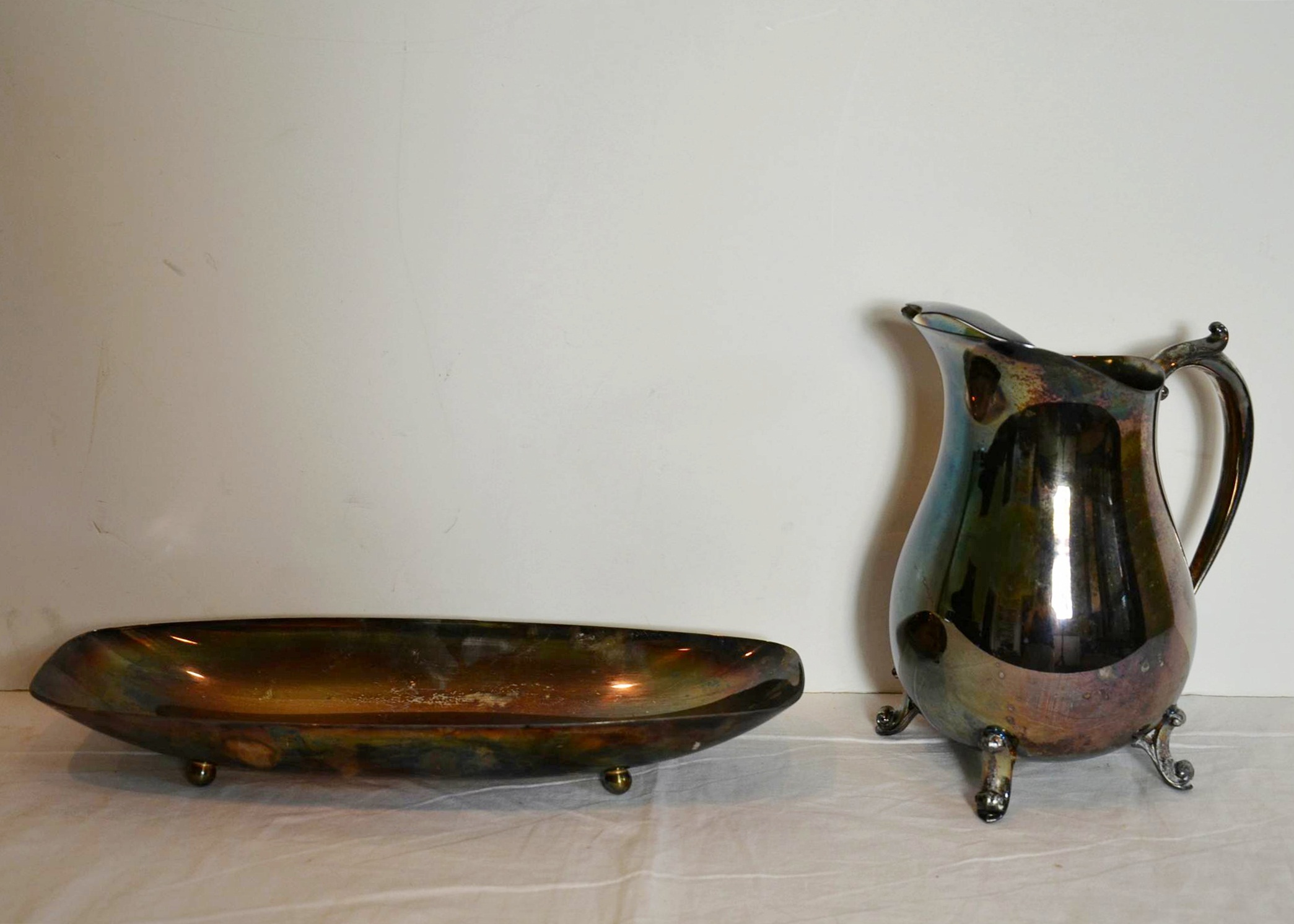 Silver plate serving items.