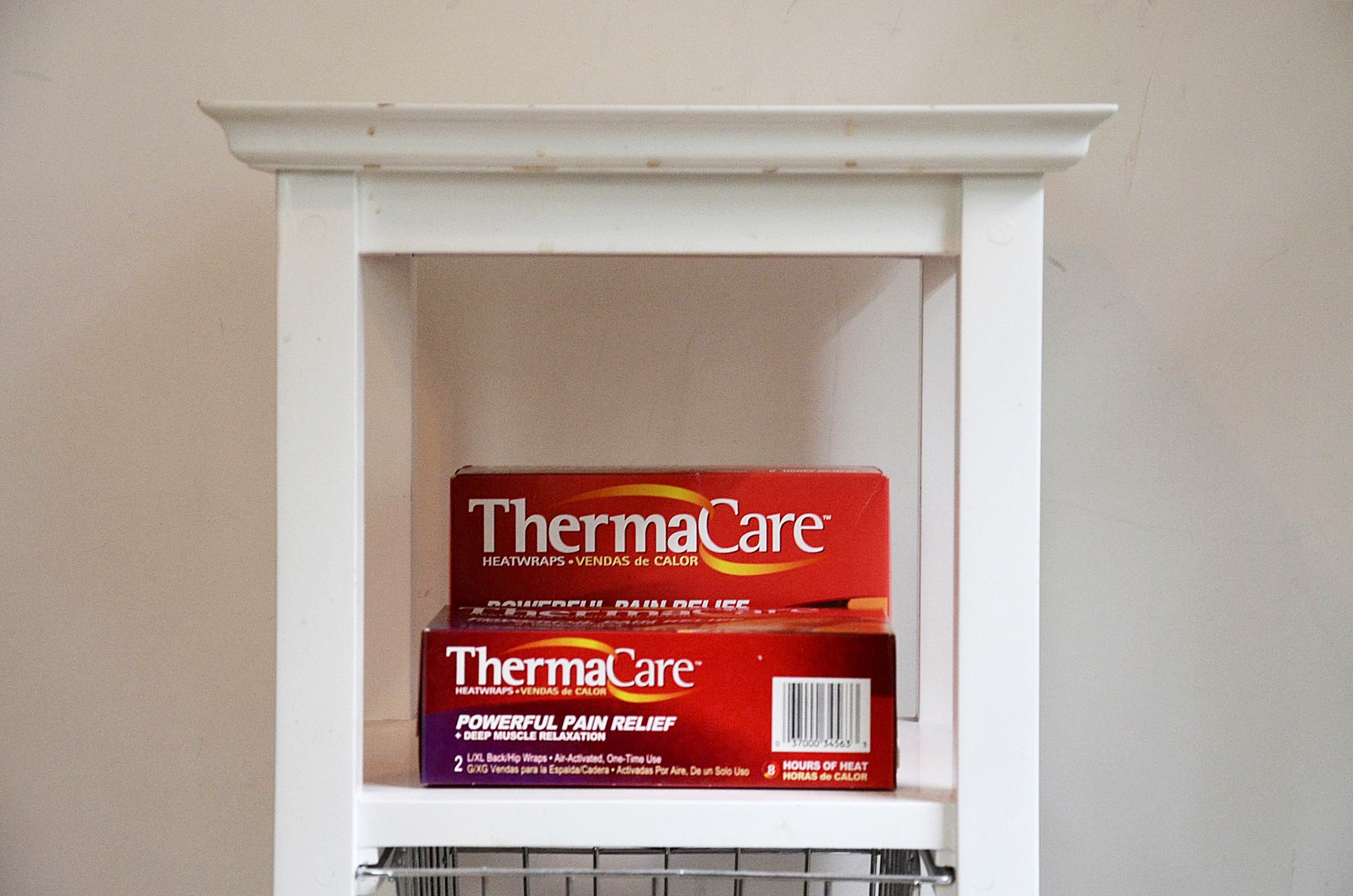 White laminate shelf. 