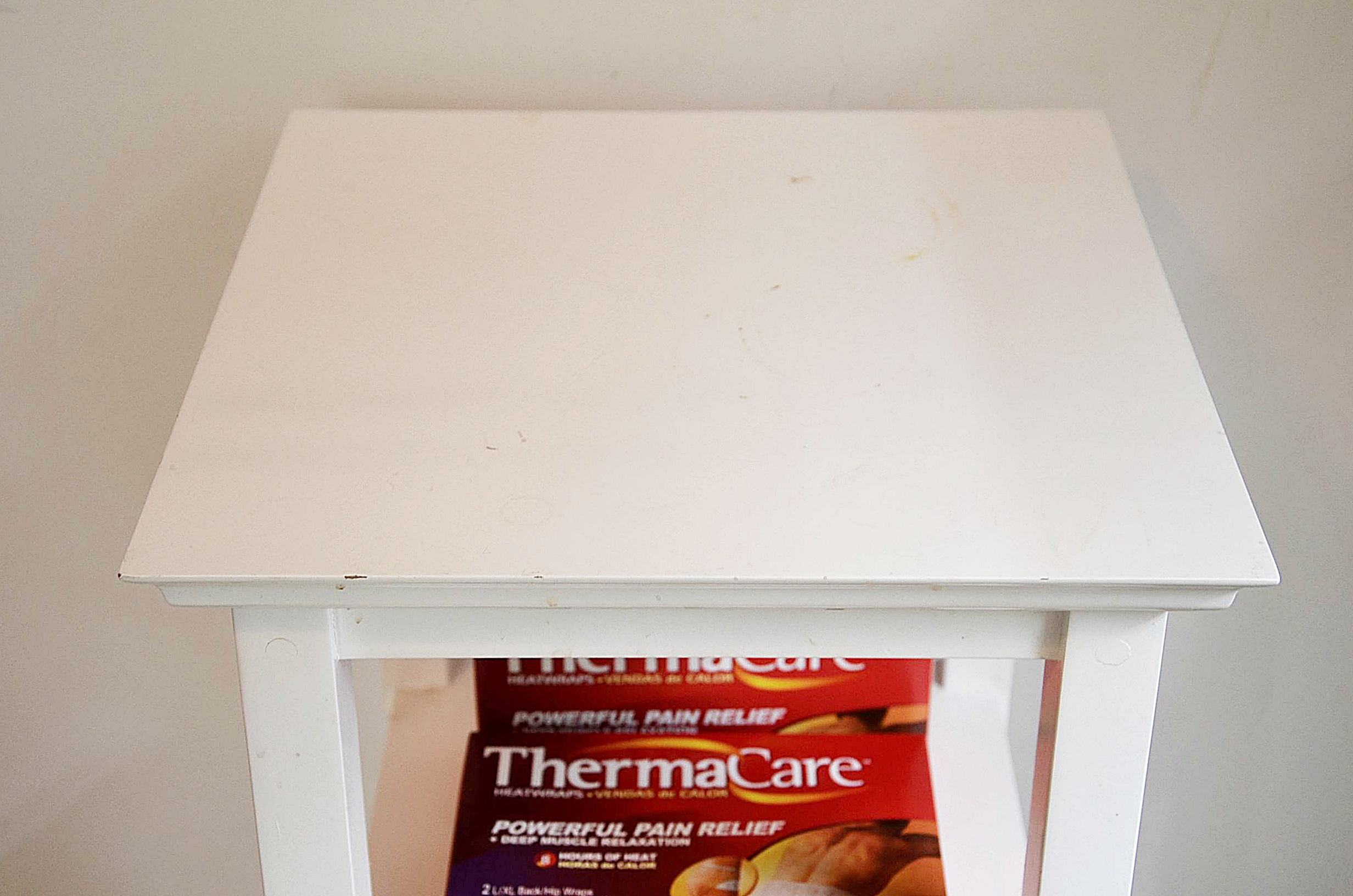 White laminate shelf. 