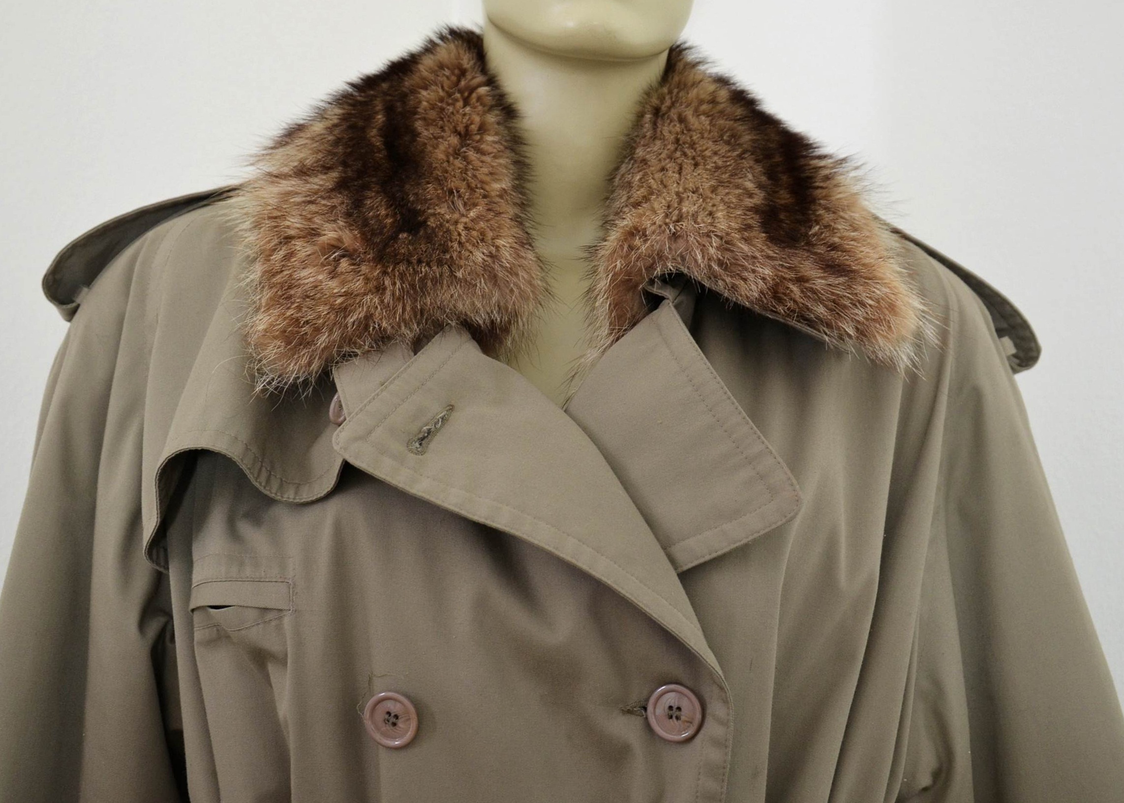 Lady Western of Canada trench coat with fur lining.