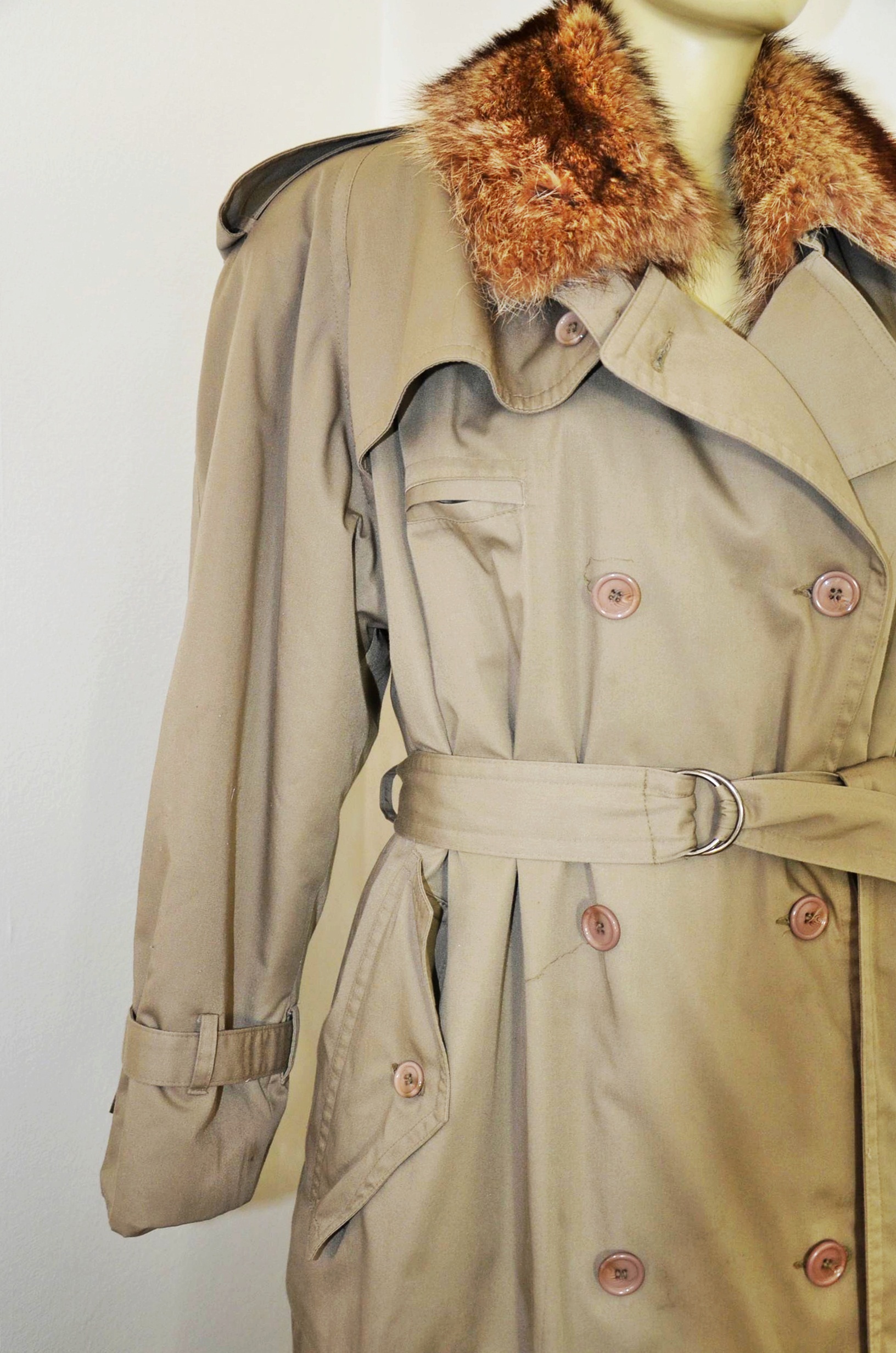 Lady Western of Canada trench coat with fur lining.