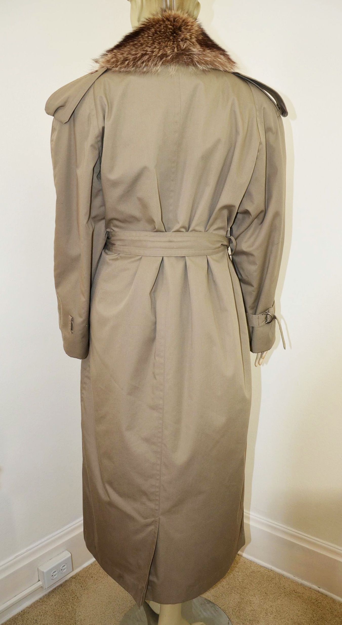 Lady Western of Canada trench coat with fur lining.