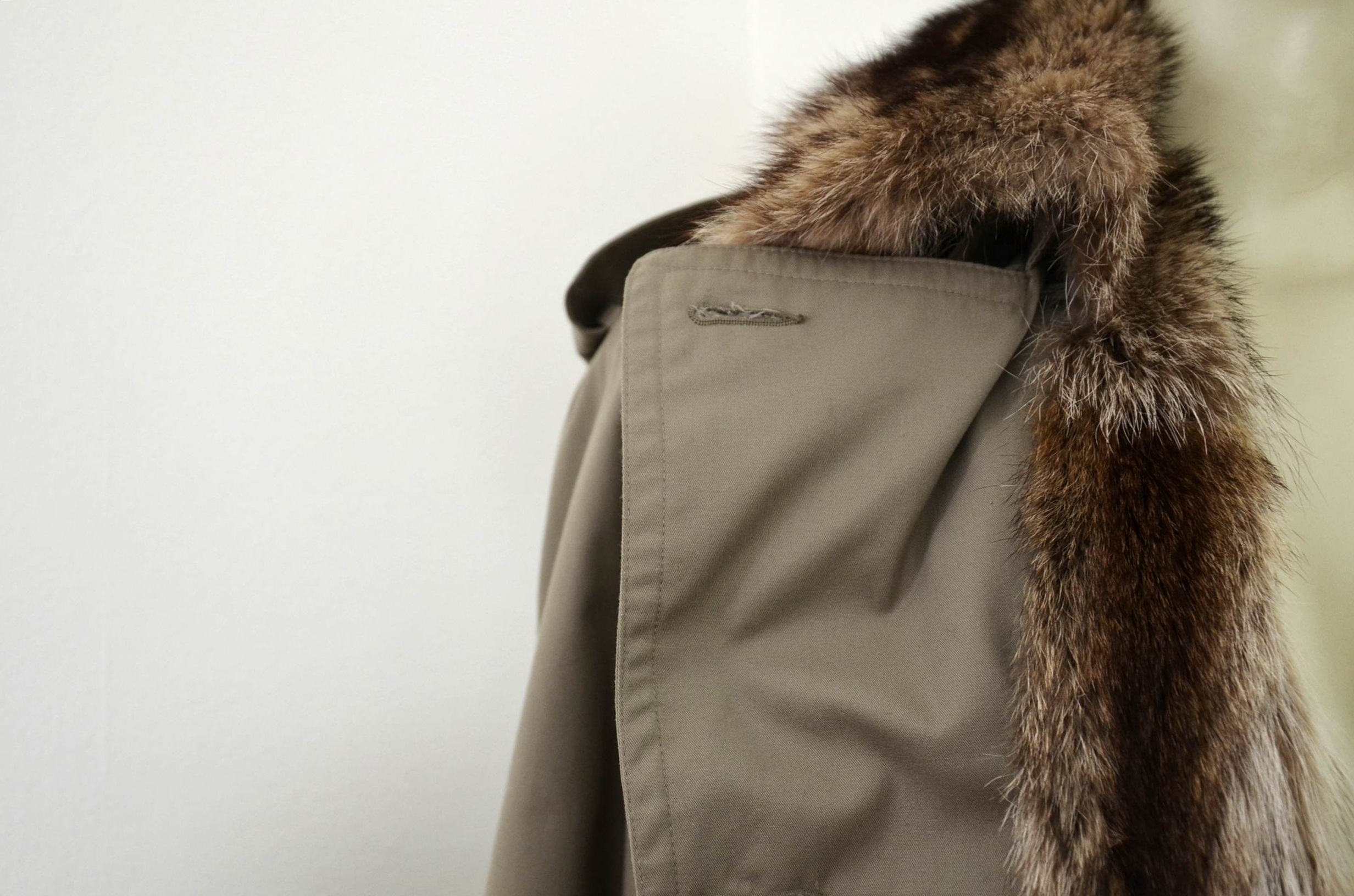 Lady Western of Canada trench coat with fur lining.