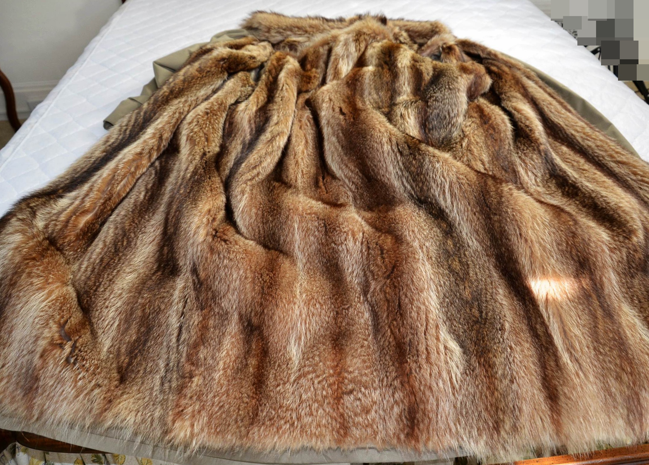 Lady Western of Canada trench coat with fur lining.