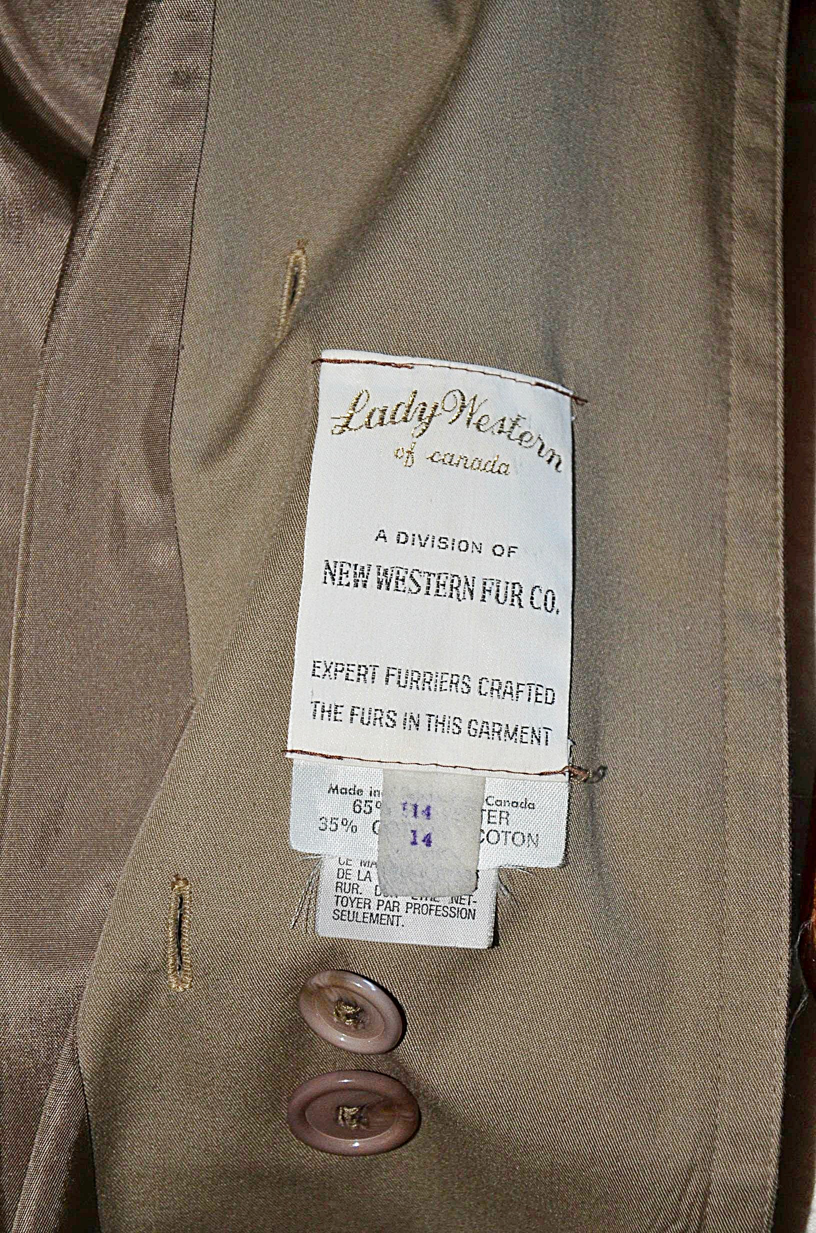 Lady Western of Canada trench coat with fur lining.