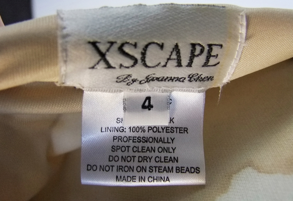 Champagne Hued Silk Evening Gown Embellished With Sequins