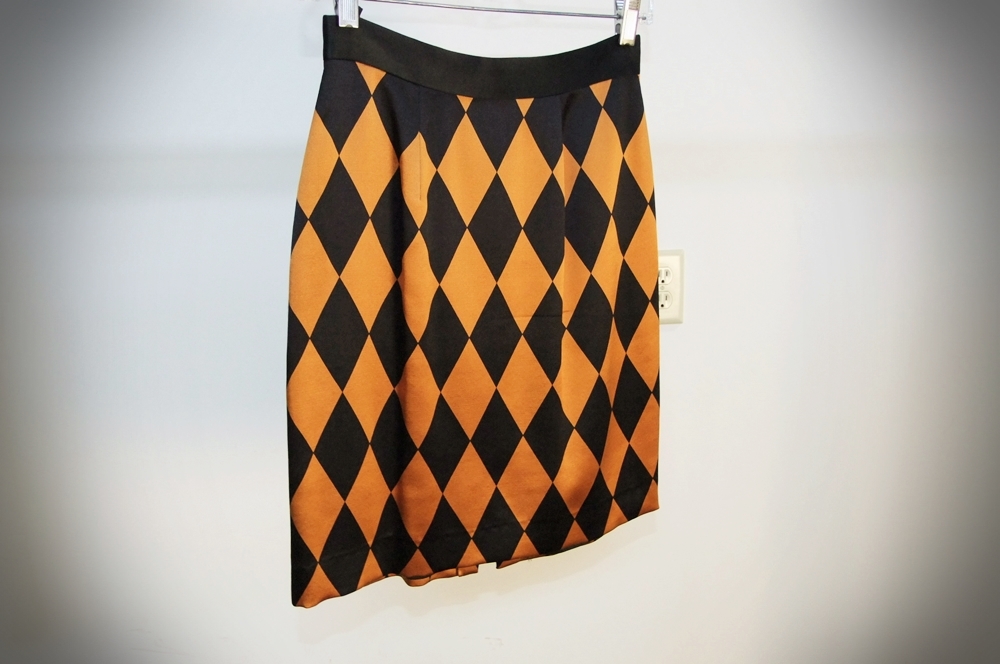 Three Piece Collection Of Designer Clothes