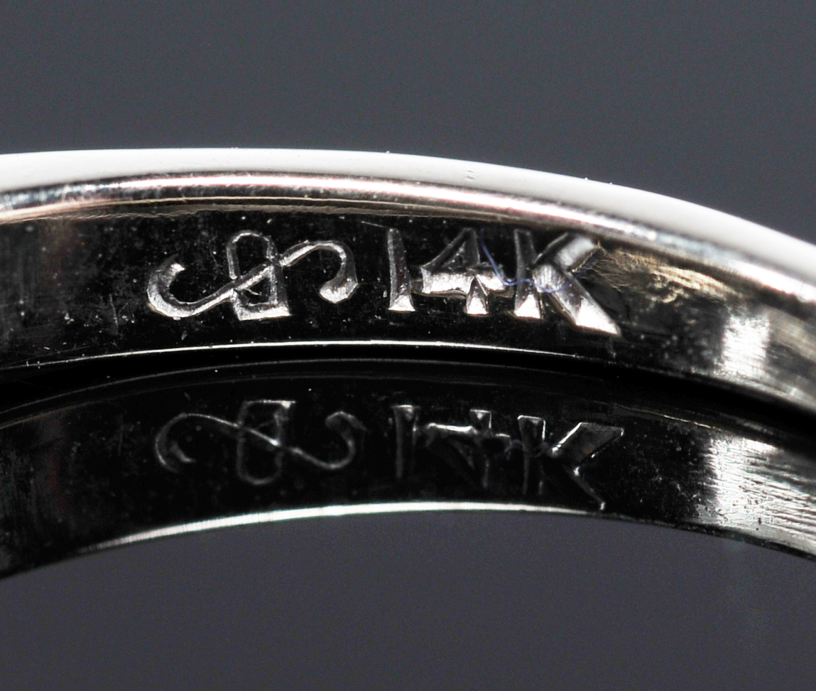 14 K White Gold And Diamond Ring