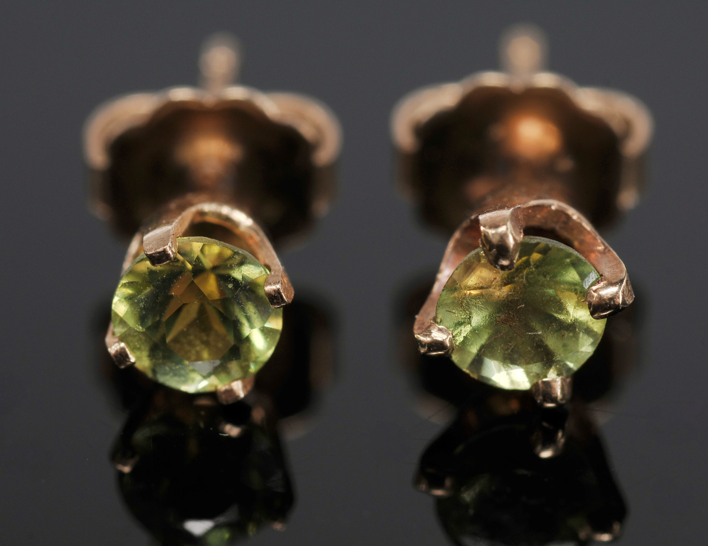 Two pair of Lady's 14 K Yellow Gold Peridot And Blue Topaz Post Earrings 