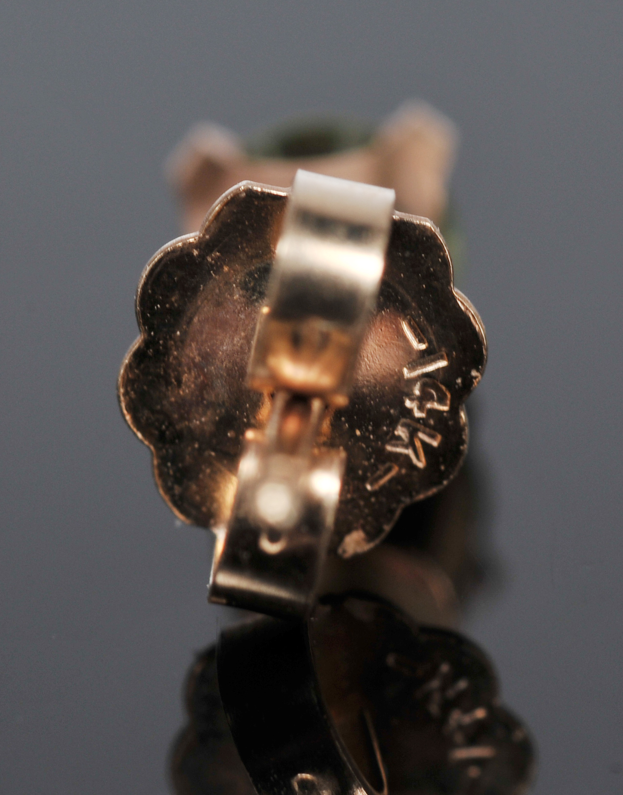 Two pair of Lady's 14 K Yellow Gold Peridot And Blue Topaz Post Earrings 