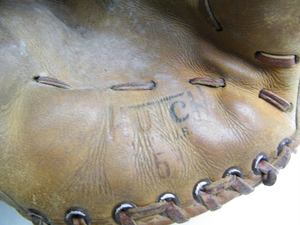 Baseball Mitts and Bats