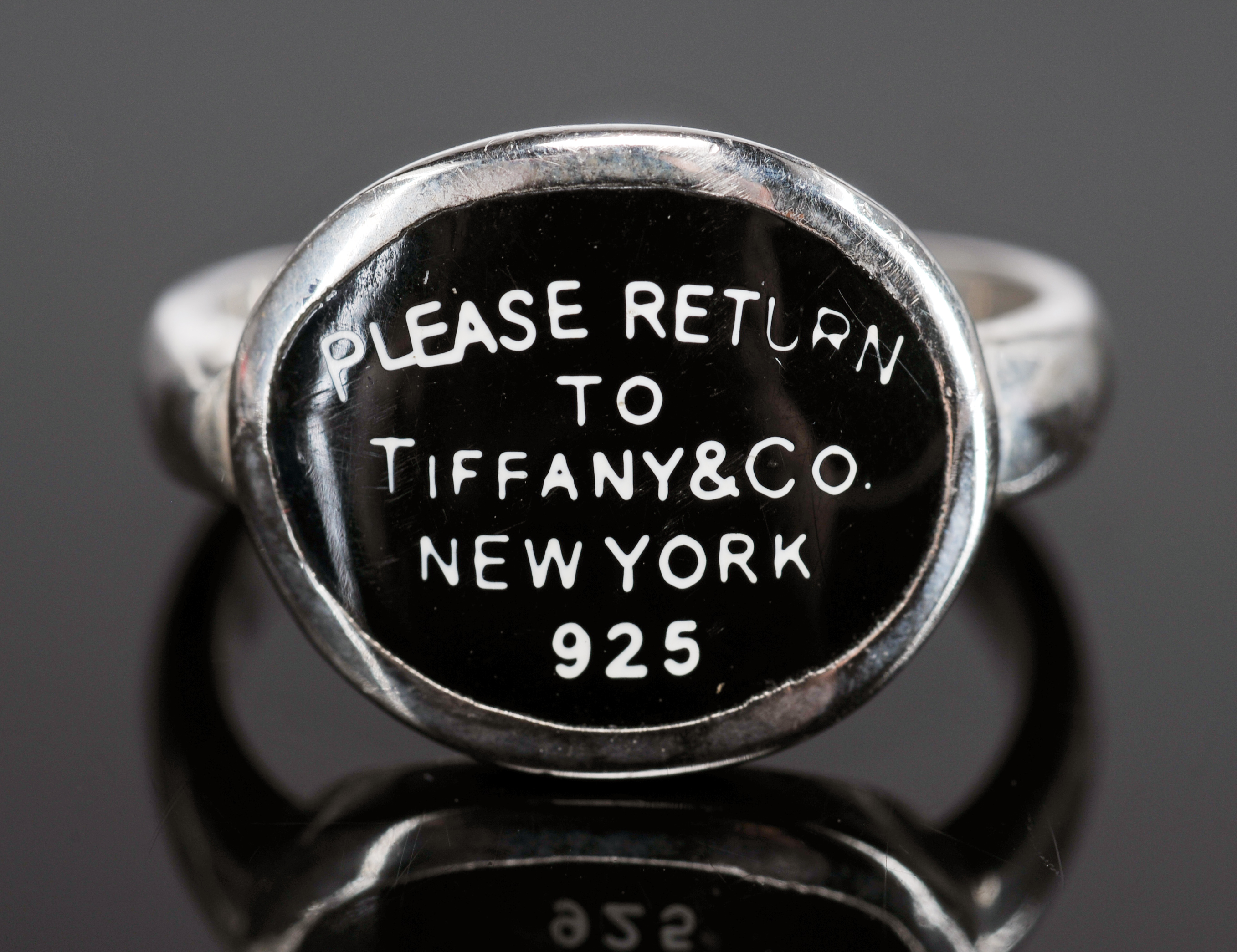 Tiffany & Co. Sterling Silver Heart shaped Pendant And Sterling Ribbon