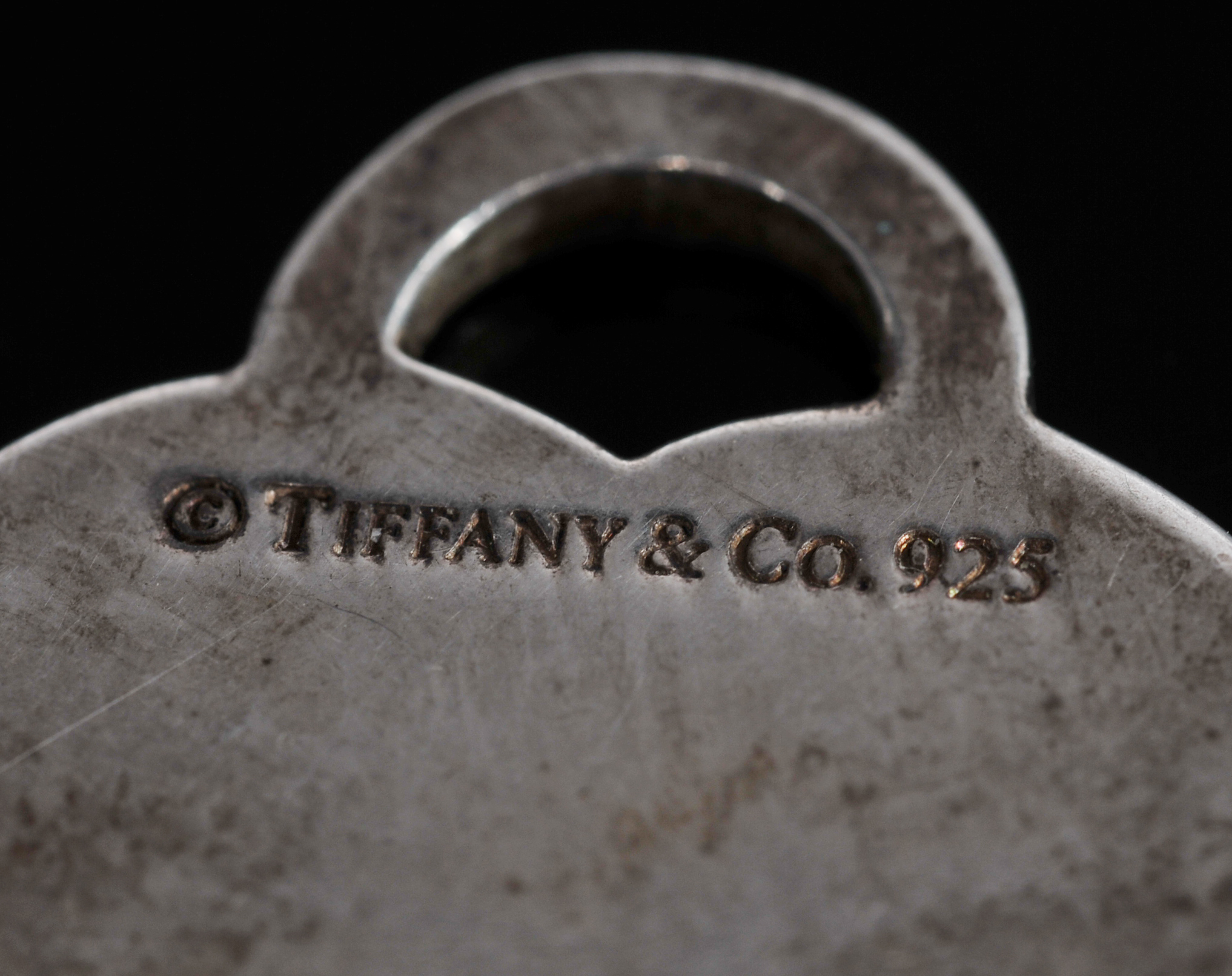 Tiffany & Co. Sterling Silver Heart shaped Pendant And Sterling Ribbon