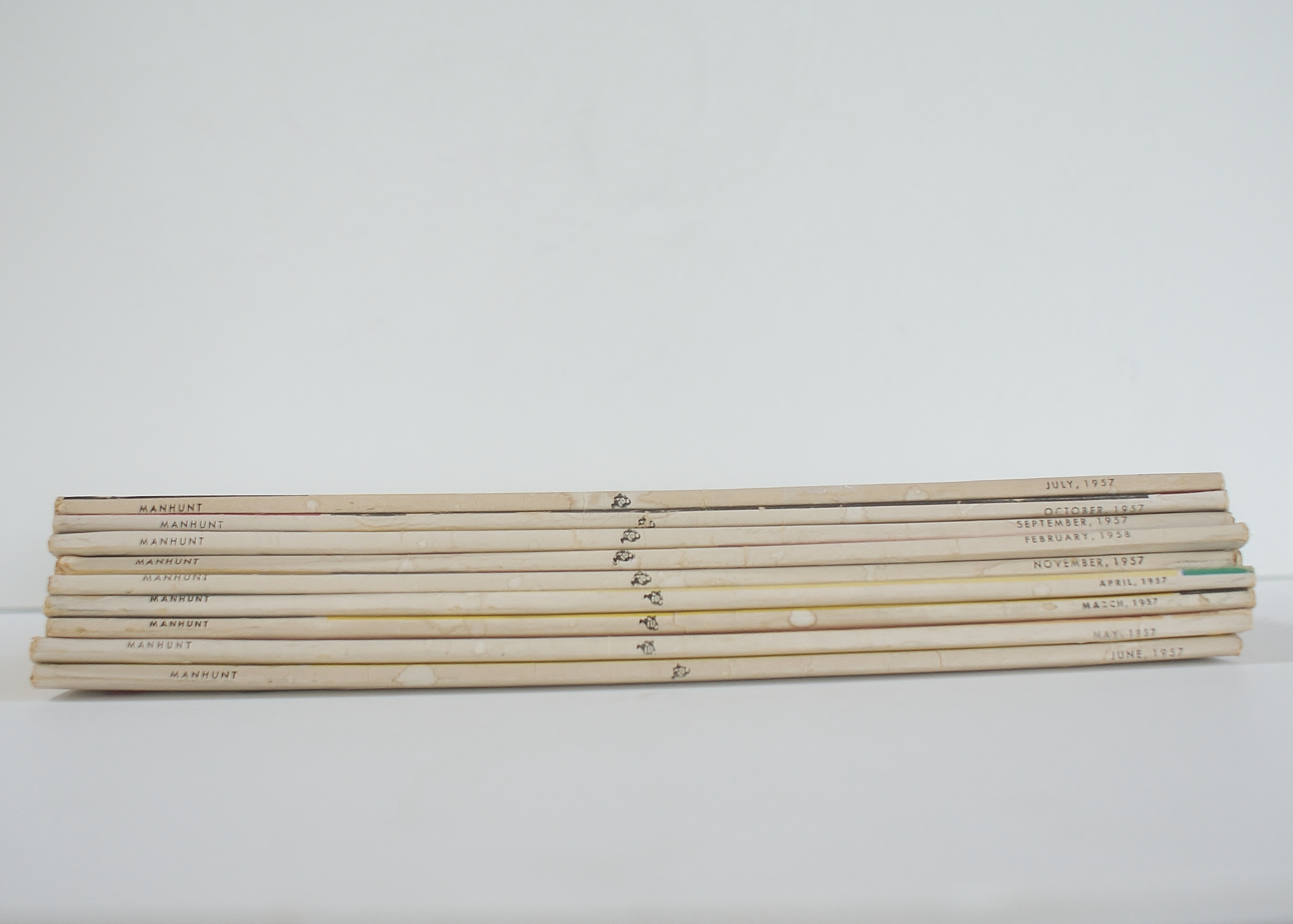 9 Vintage "Manhunt" Detective Magazines