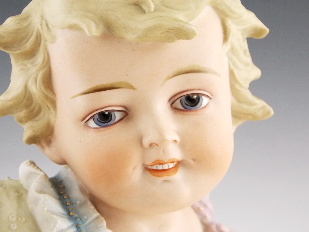 An Antique German Bisque Piano baby, Substantial in Size 