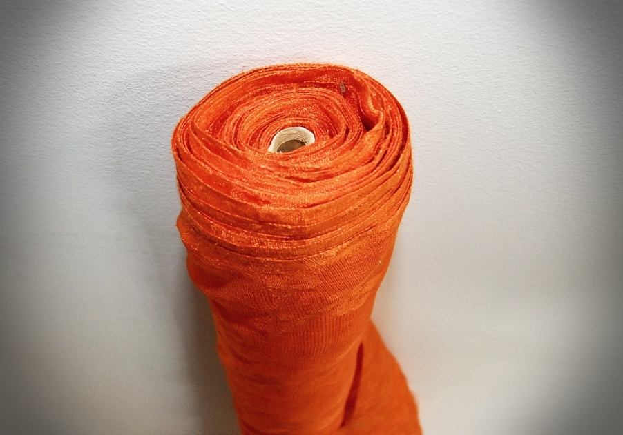 Bolt of Vintage Brocade Style fabric in Mandarin Orange with Cherry Blossoms