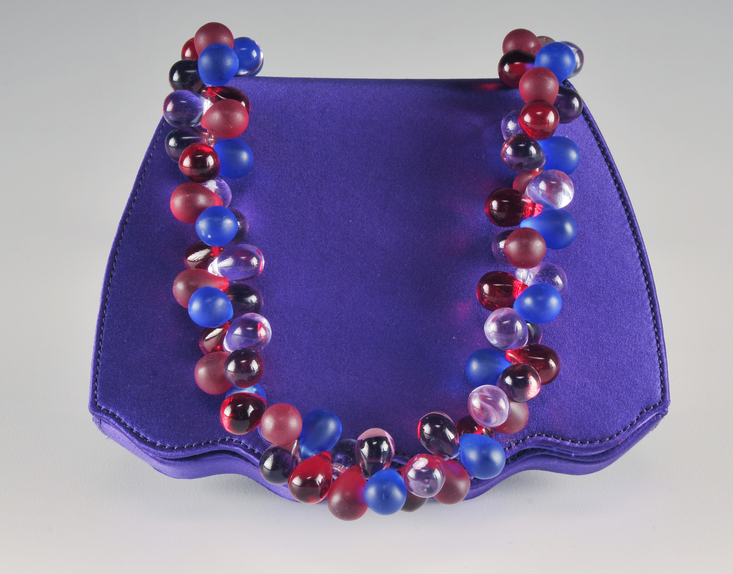  Renaud Pellegrino and Red Suede Handbag