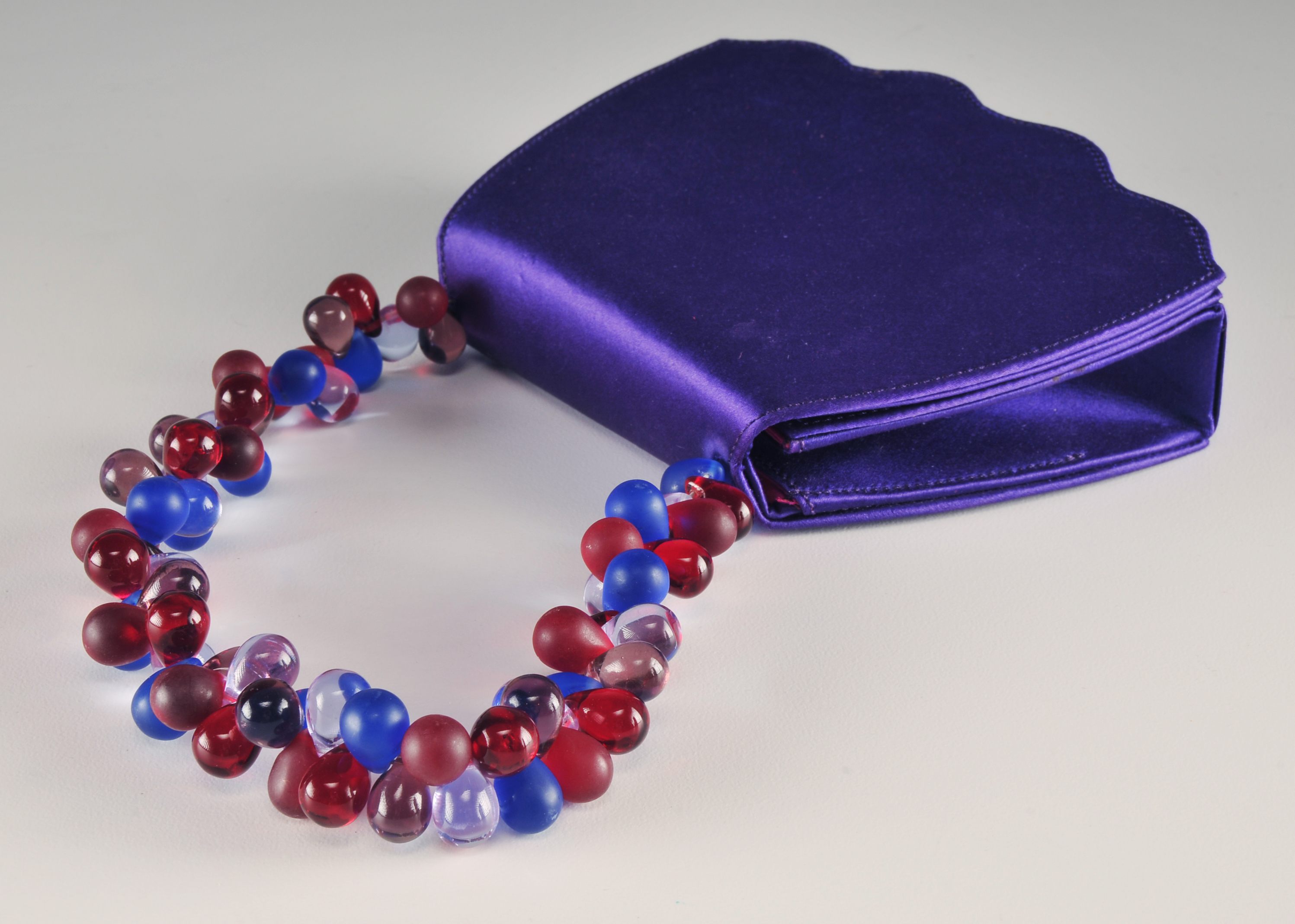  Renaud Pellegrino and Red Suede Handbag