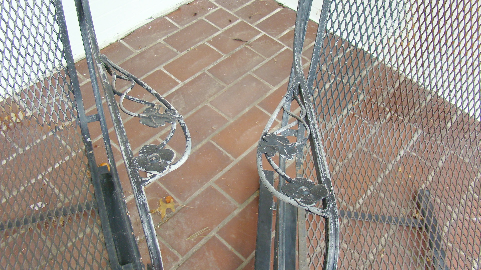 Pair of Vintage Wrought Iron Out Door Chairs