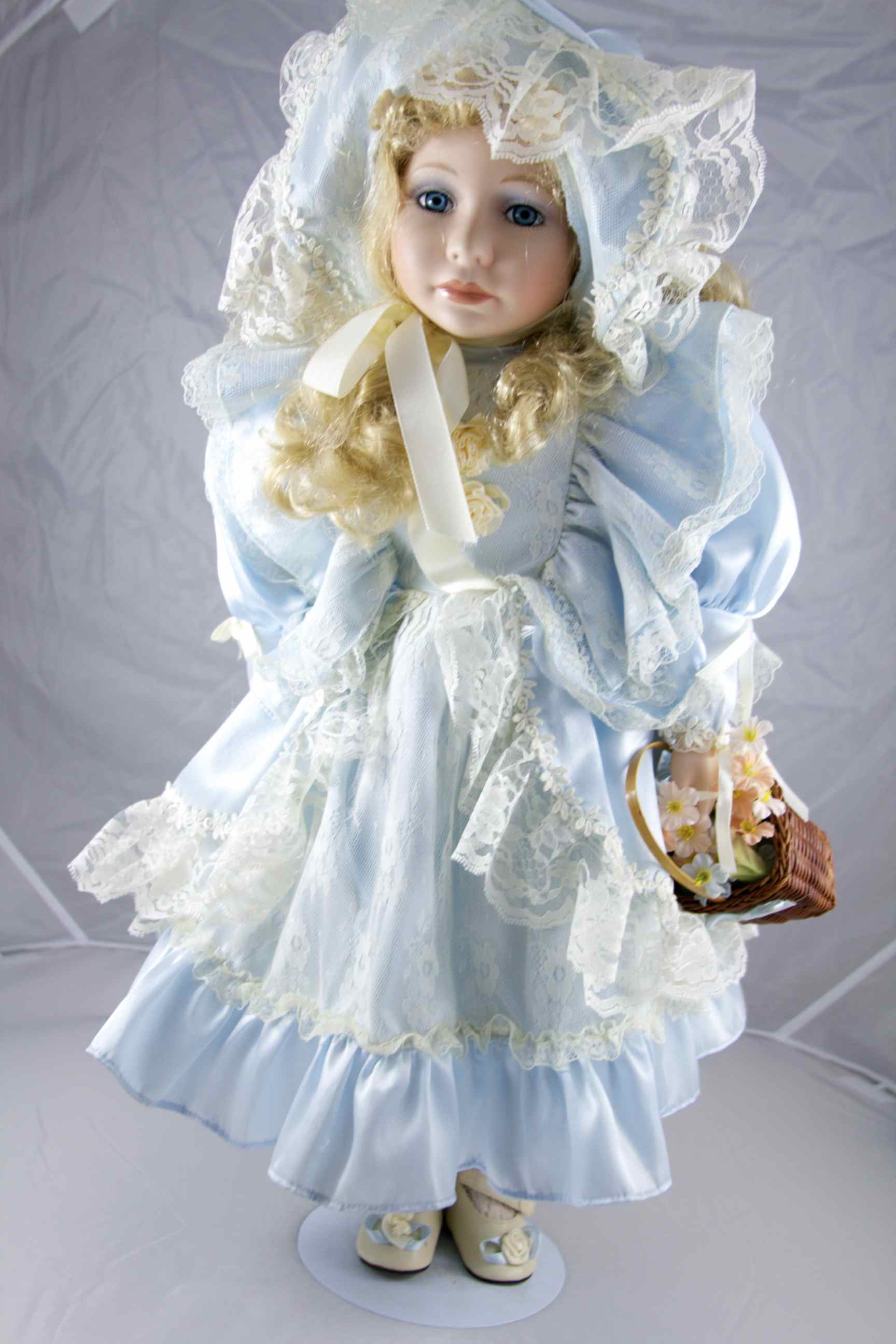 Beautiful Porcelain Doll in Blue Satin Dress