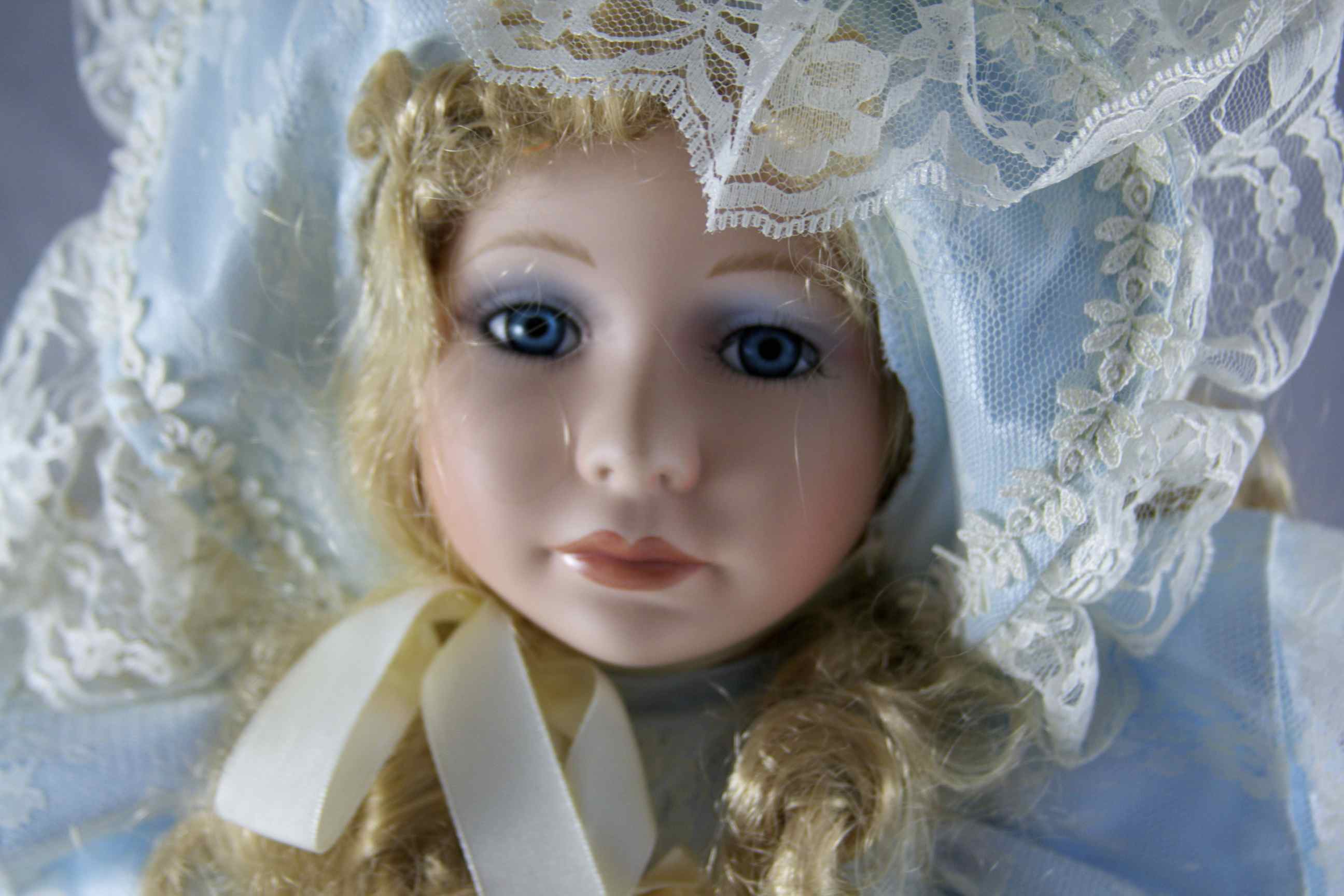 Beautiful Porcelain Doll in Blue Satin Dress