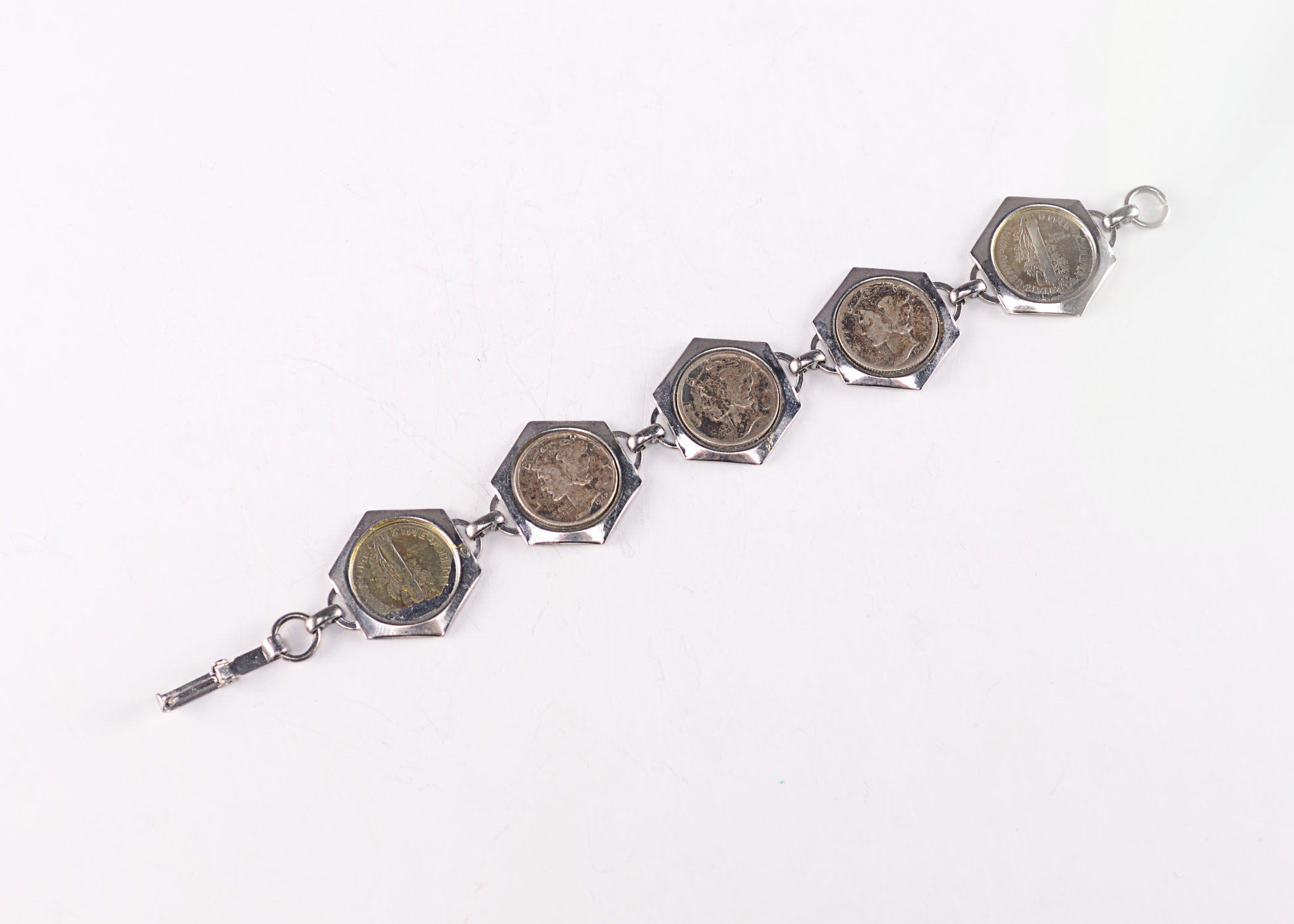 Group of (5) silver  Mercury dimes in a charm bracelet