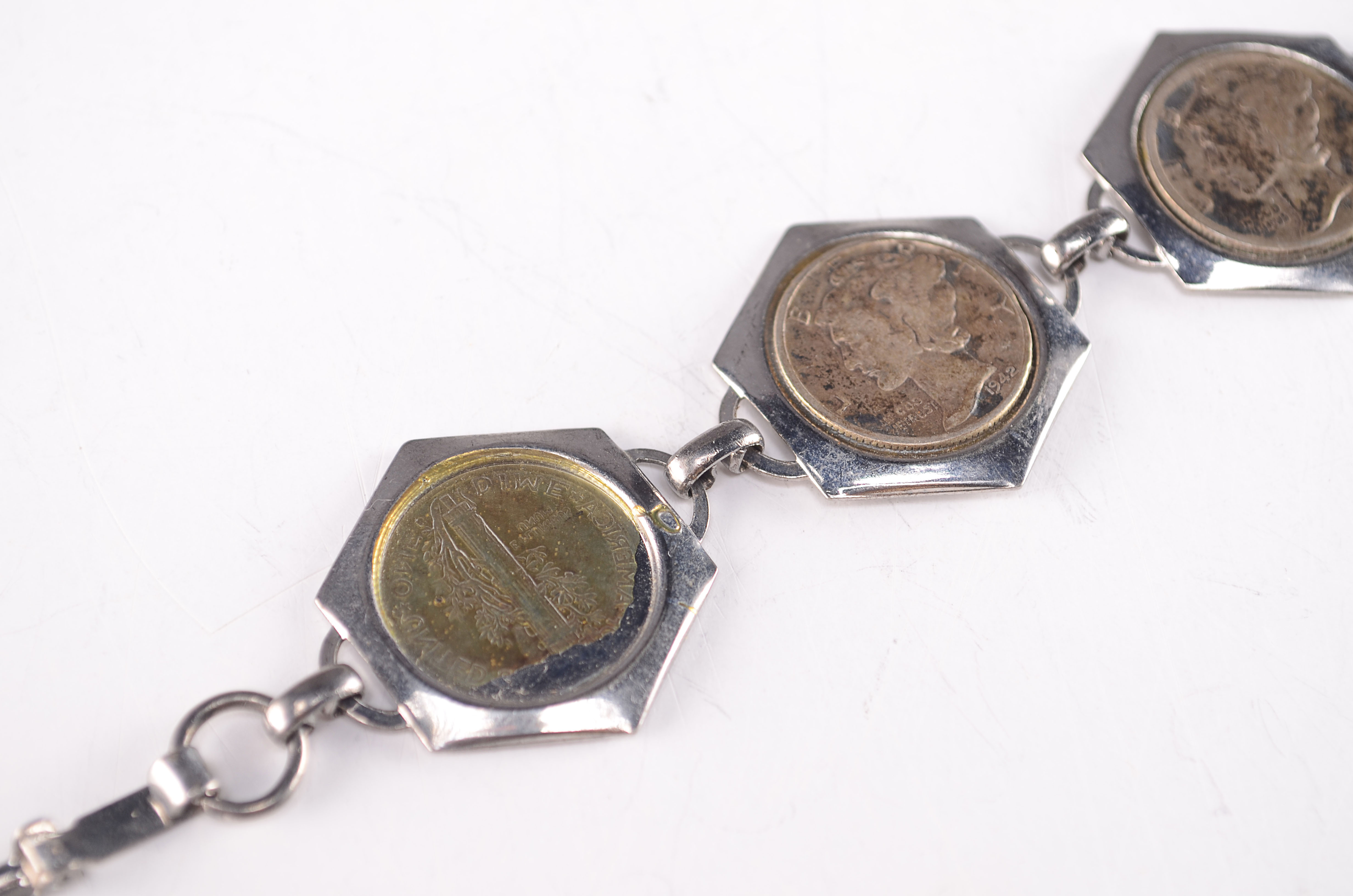 Group of (5) silver  Mercury dimes in a charm bracelet