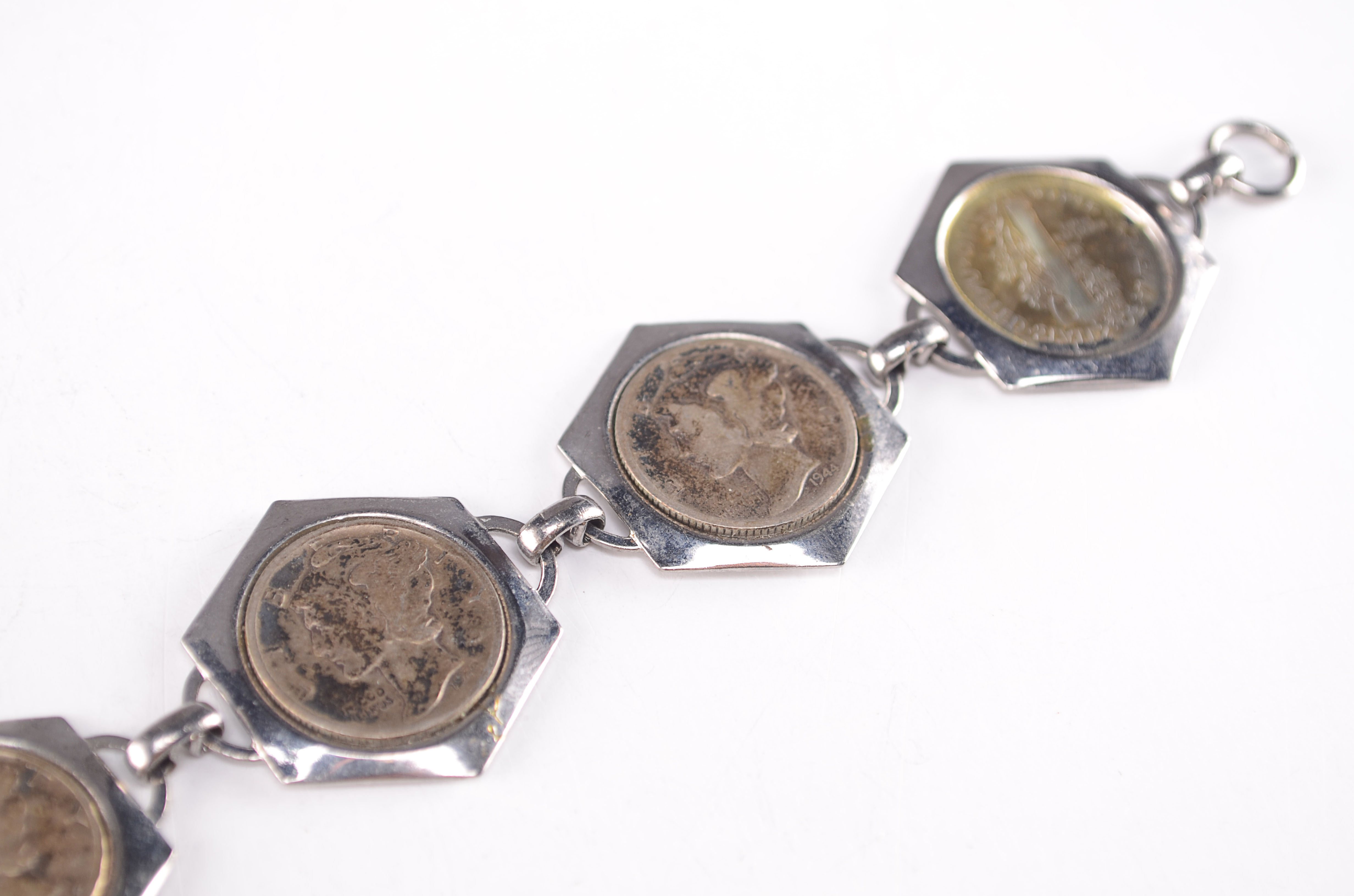 Group of (5) silver  Mercury dimes in a charm bracelet