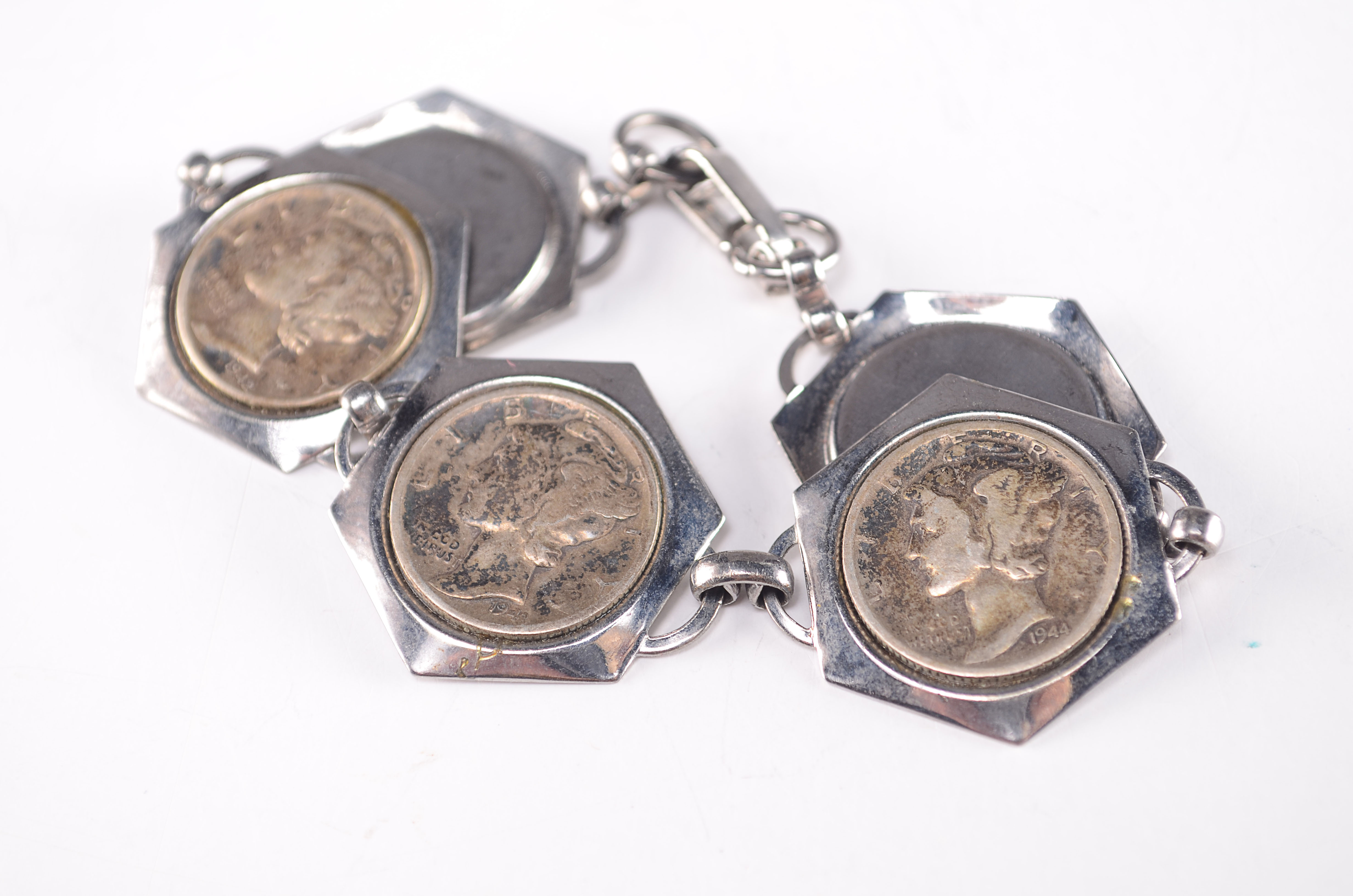 Group of (5) silver  Mercury dimes in a charm bracelet