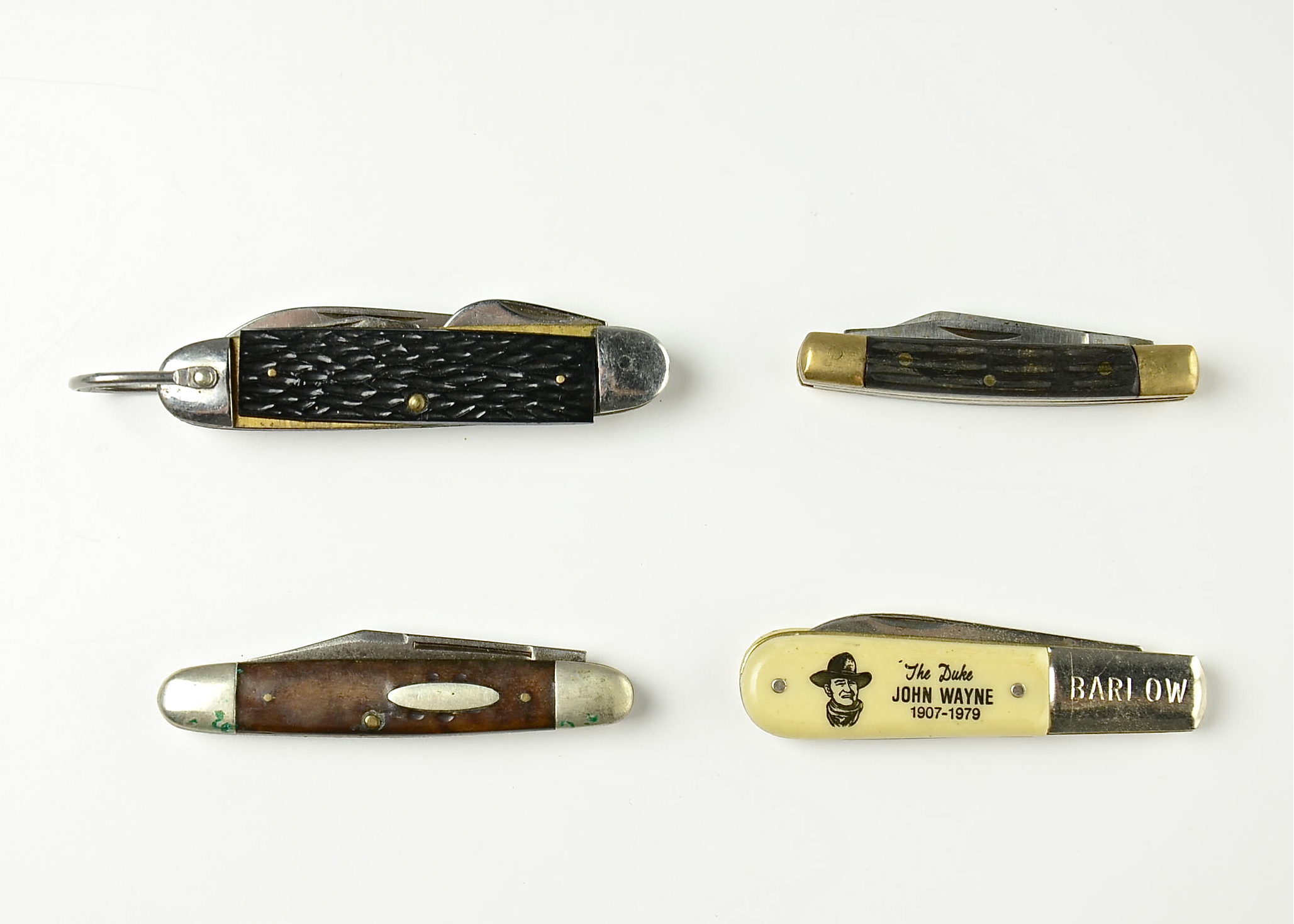 Group of (4) various pocket knives.