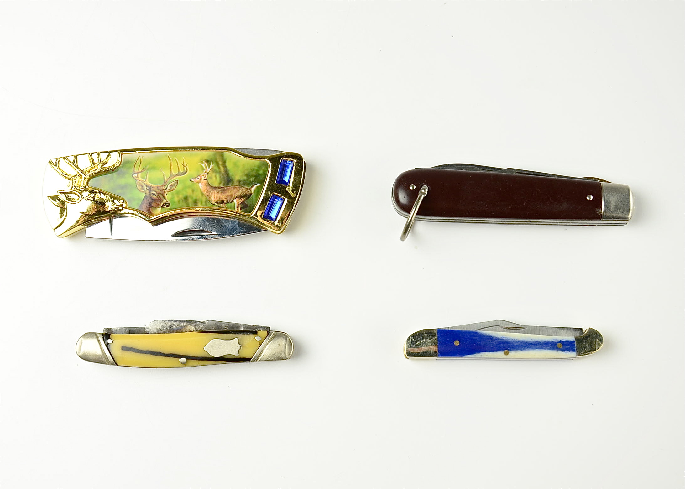 Group of (4) various pocket knives.