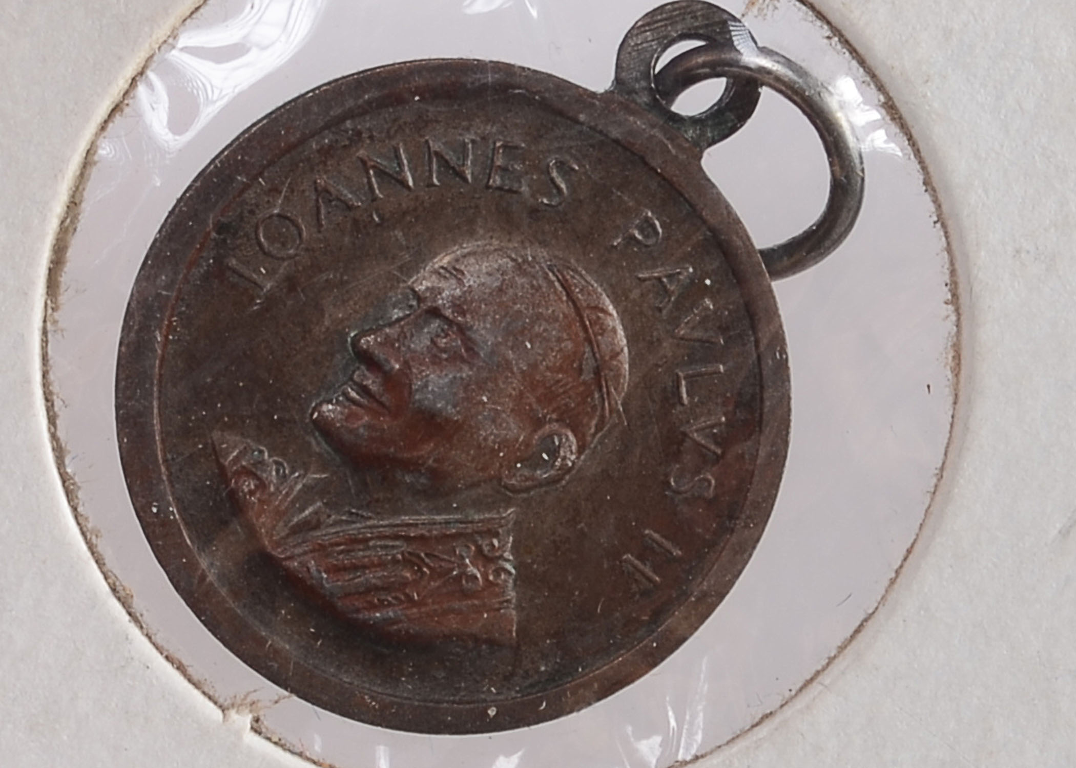 Group of (6) vintage religious tokens/pendants