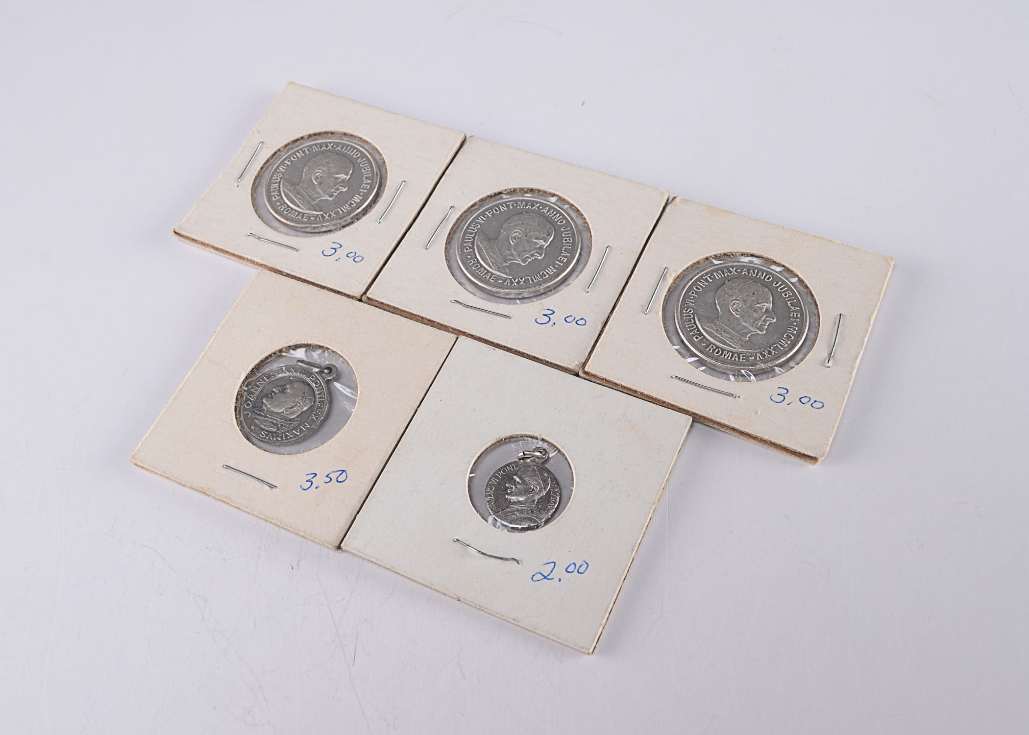 Group of (5) vintage religious tokens/pendants