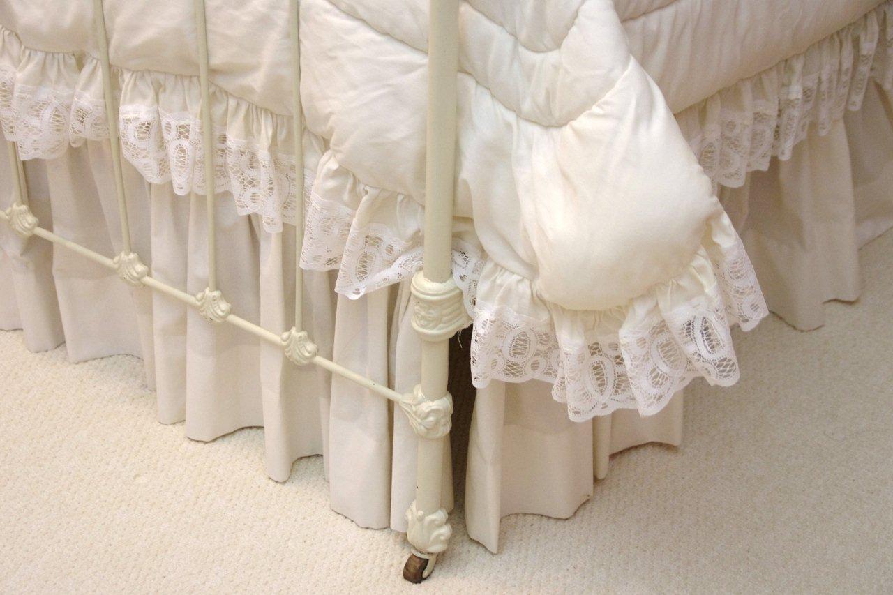Victorian Style Cast Iron Bed, with white painted finish and white lace comforter set