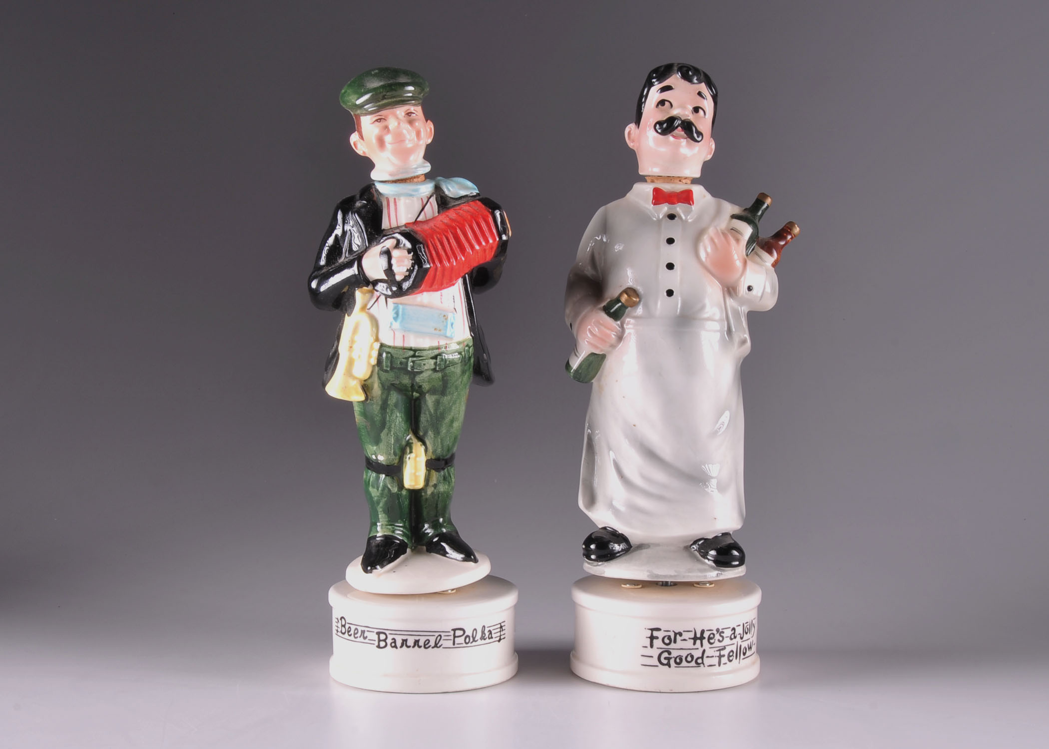 Pair of Vintage Wind Up Decanters