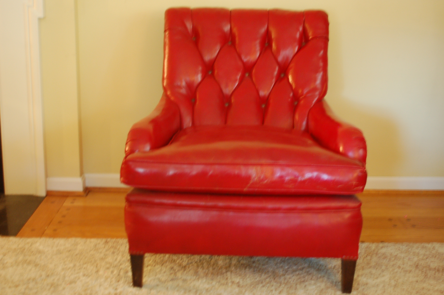 Red Leather Overstuffed Wing Chair
