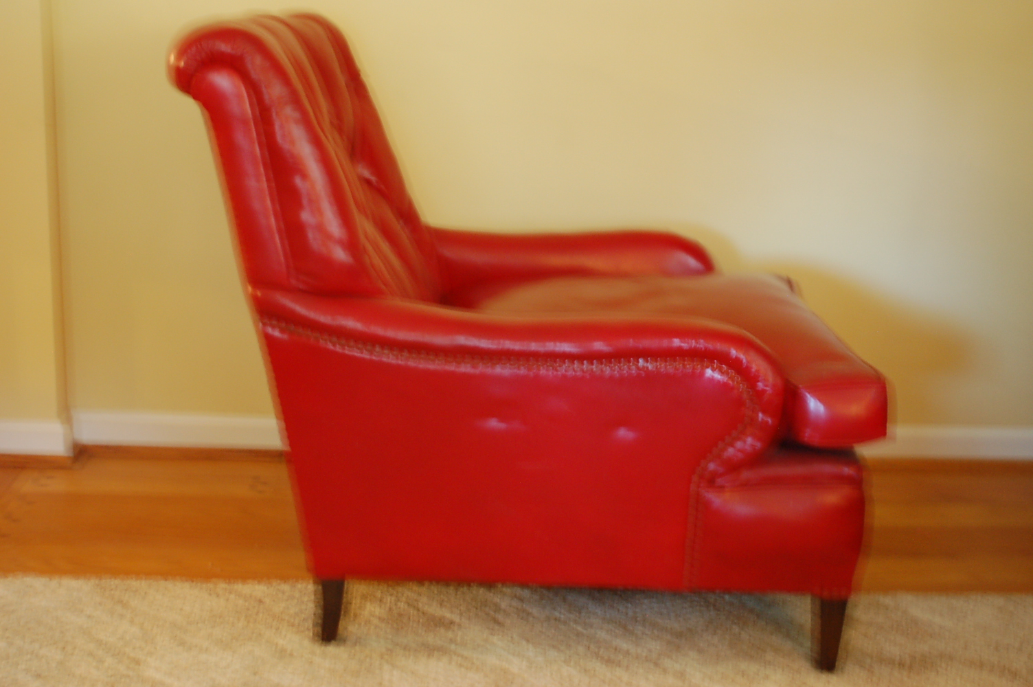 Red Leather Overstuffed Wing Chair