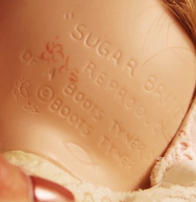 Vintage wooden doll cradle, with 'Sugar Britches' reproduction baby doll