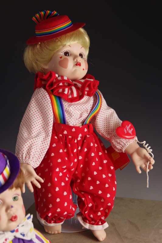 Collection of Mary Tretter Porcelain Dolls, dressed as Clowns