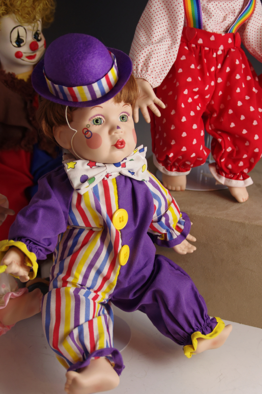 Collection of Mary Tretter Porcelain Dolls, dressed as Clowns