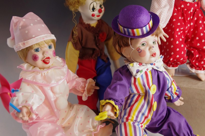 Collection of Mary Tretter Porcelain Dolls, dressed as Clowns