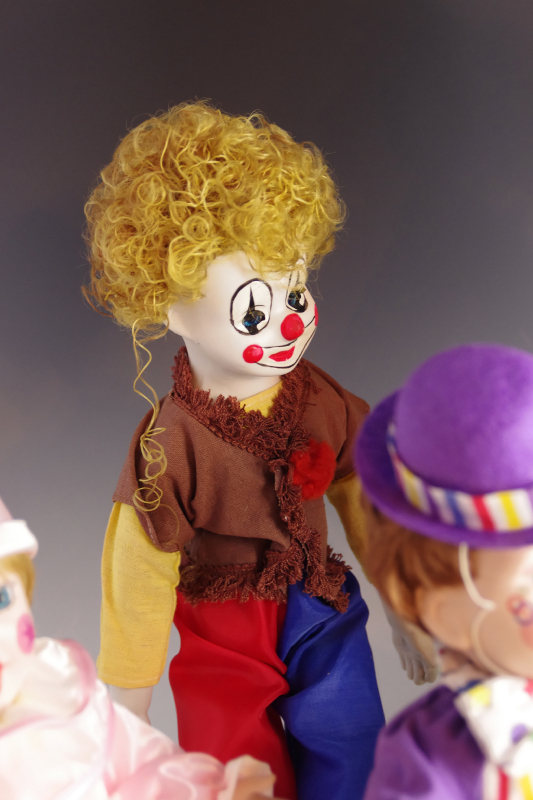 Collection of Mary Tretter Porcelain Dolls, dressed as Clowns