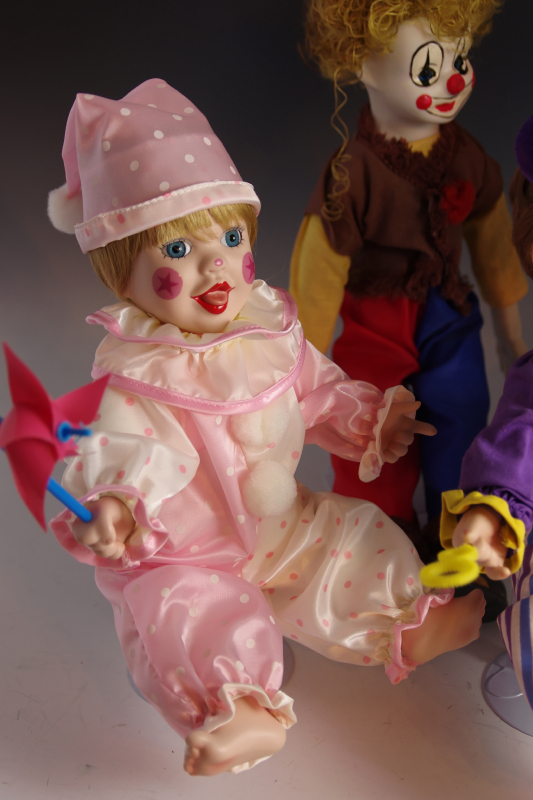 Collection of Mary Tretter Porcelain Dolls, dressed as Clowns
