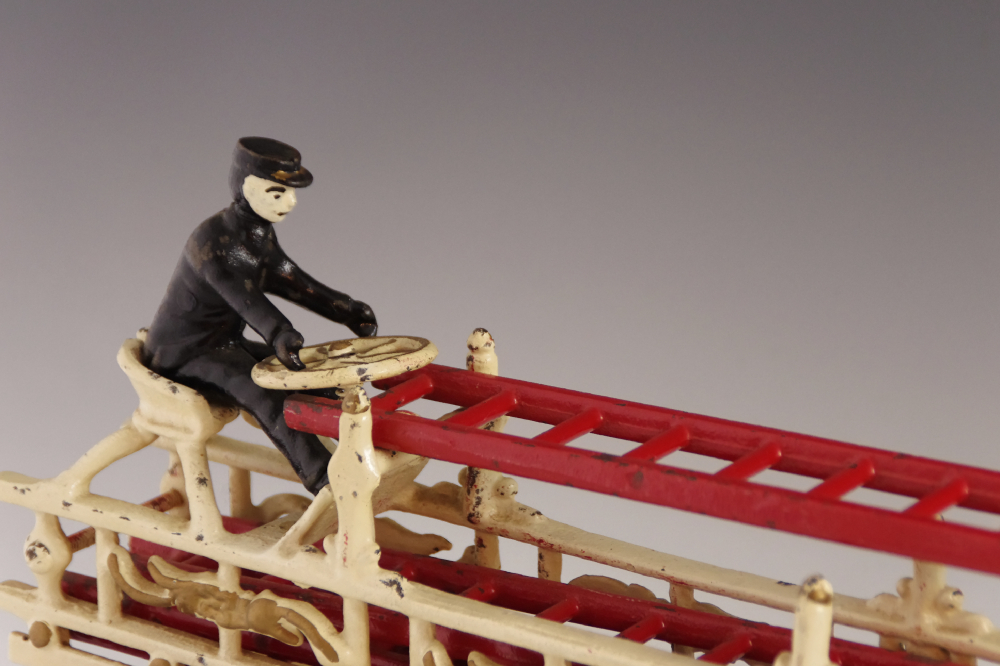 Antique Cast Iron Toy Fire Wagon, with two Drivers and Team of Galloping Horses