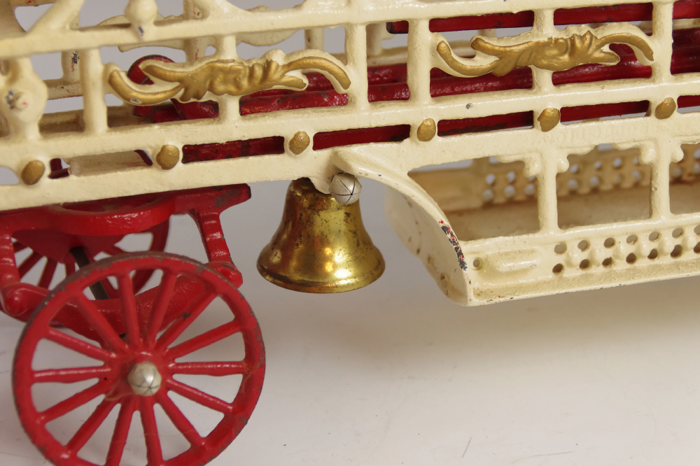 Antique Cast Iron Toy Fire Wagon, with two Drivers and Team of Galloping Horses