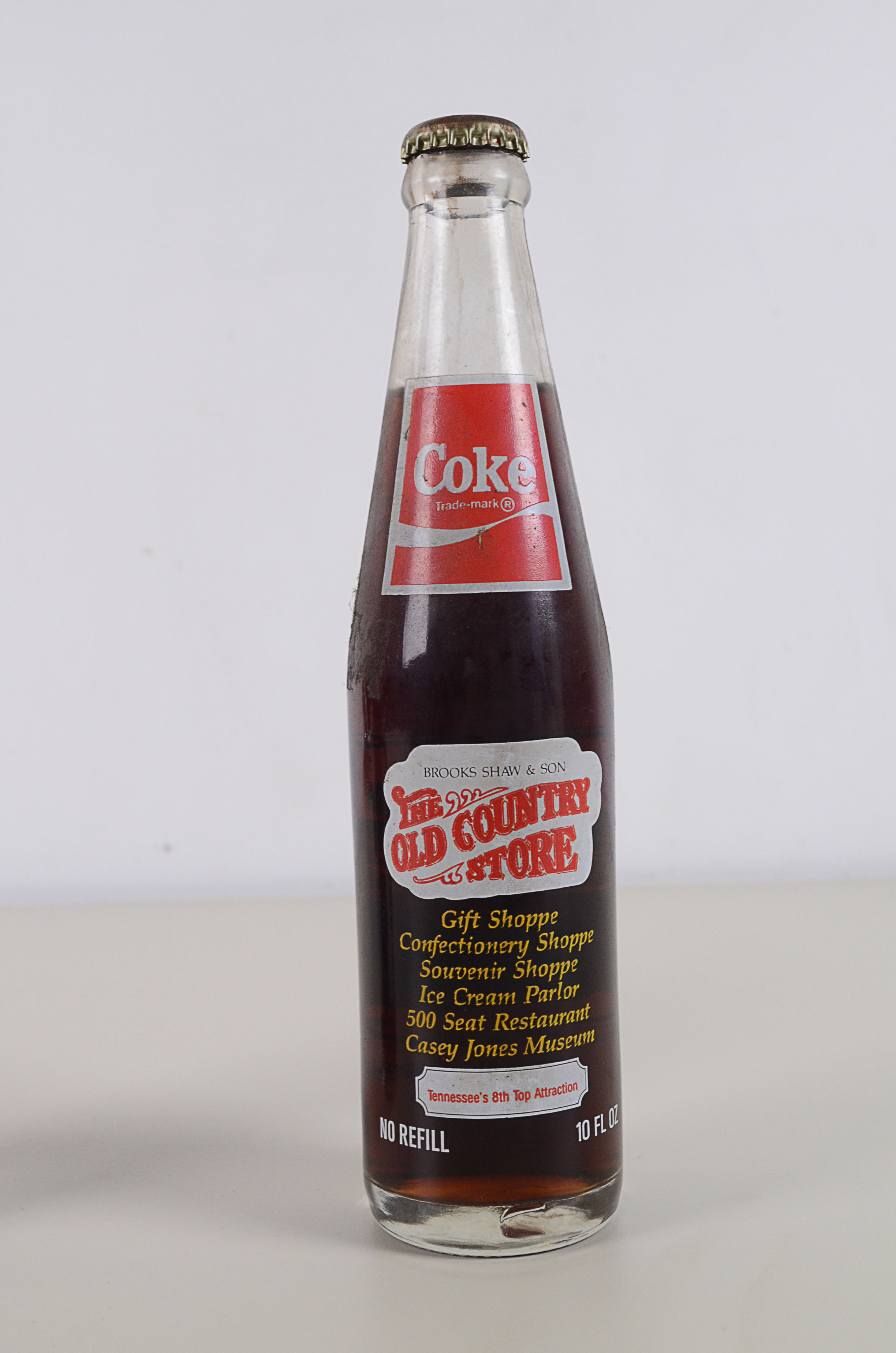 Two Vintage Commemorative Coke Bottles