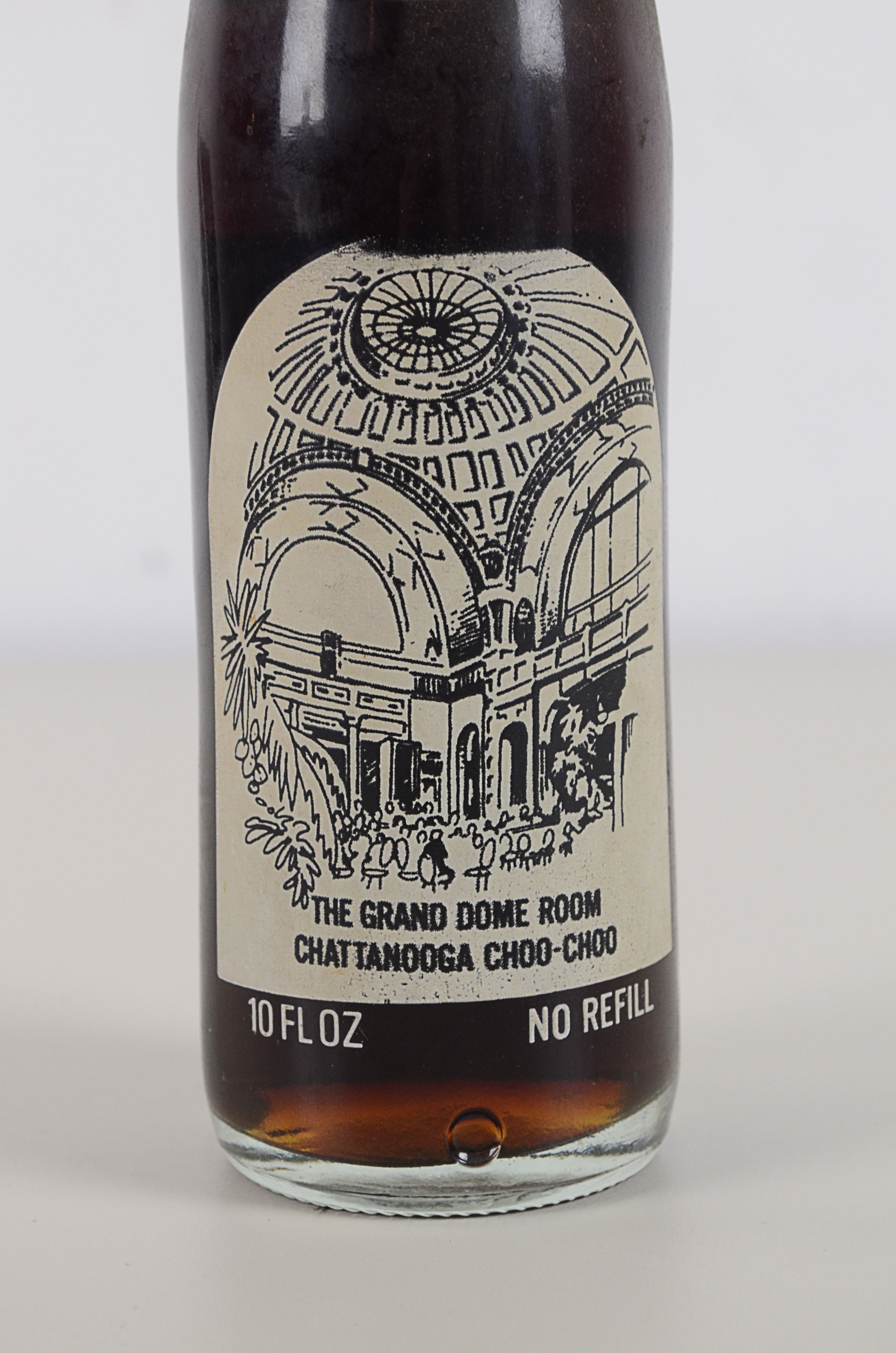 Two Vintage Commemorative Coke Bottles