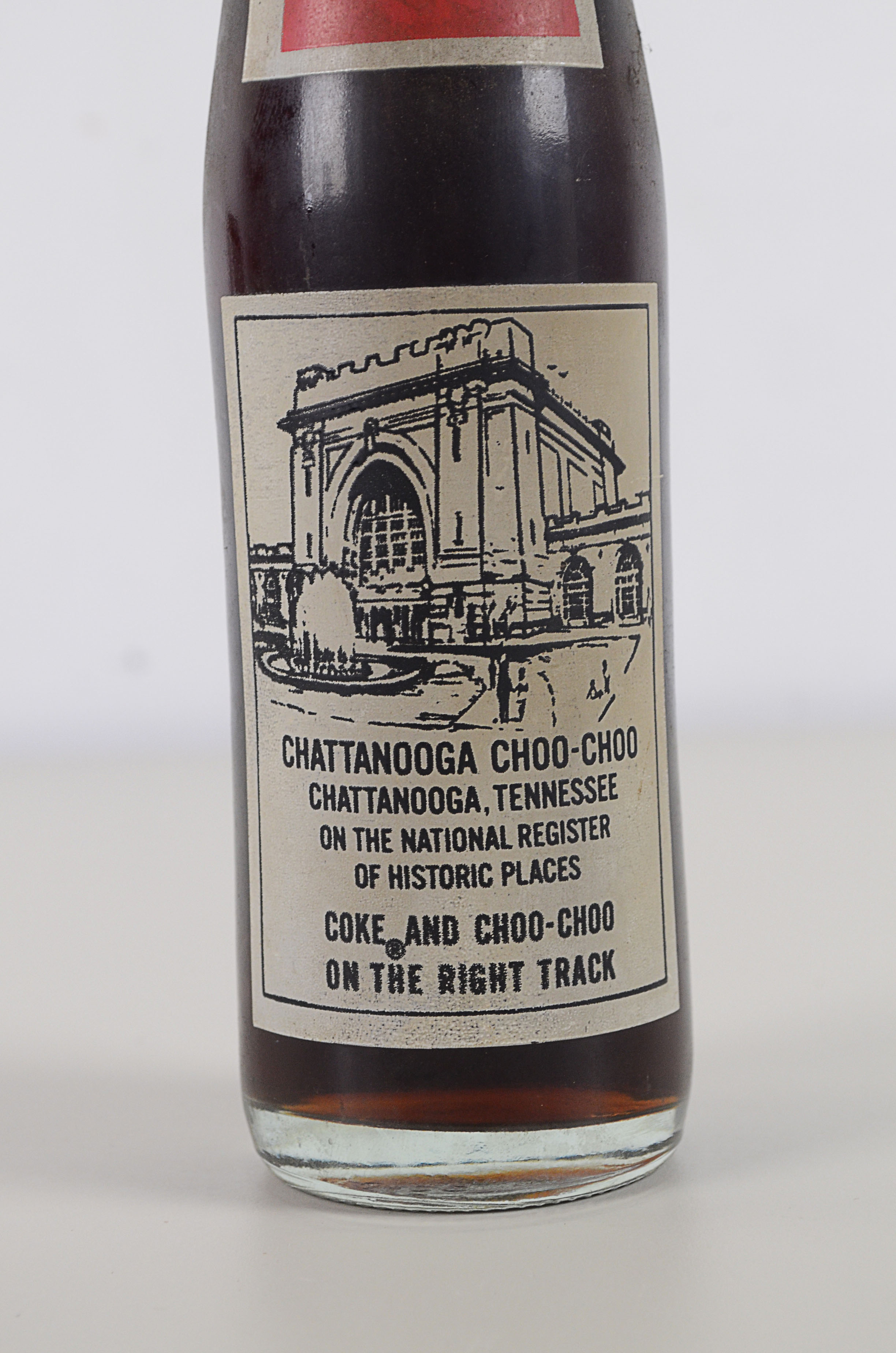 Two Vintage Commemorative Coke Bottles