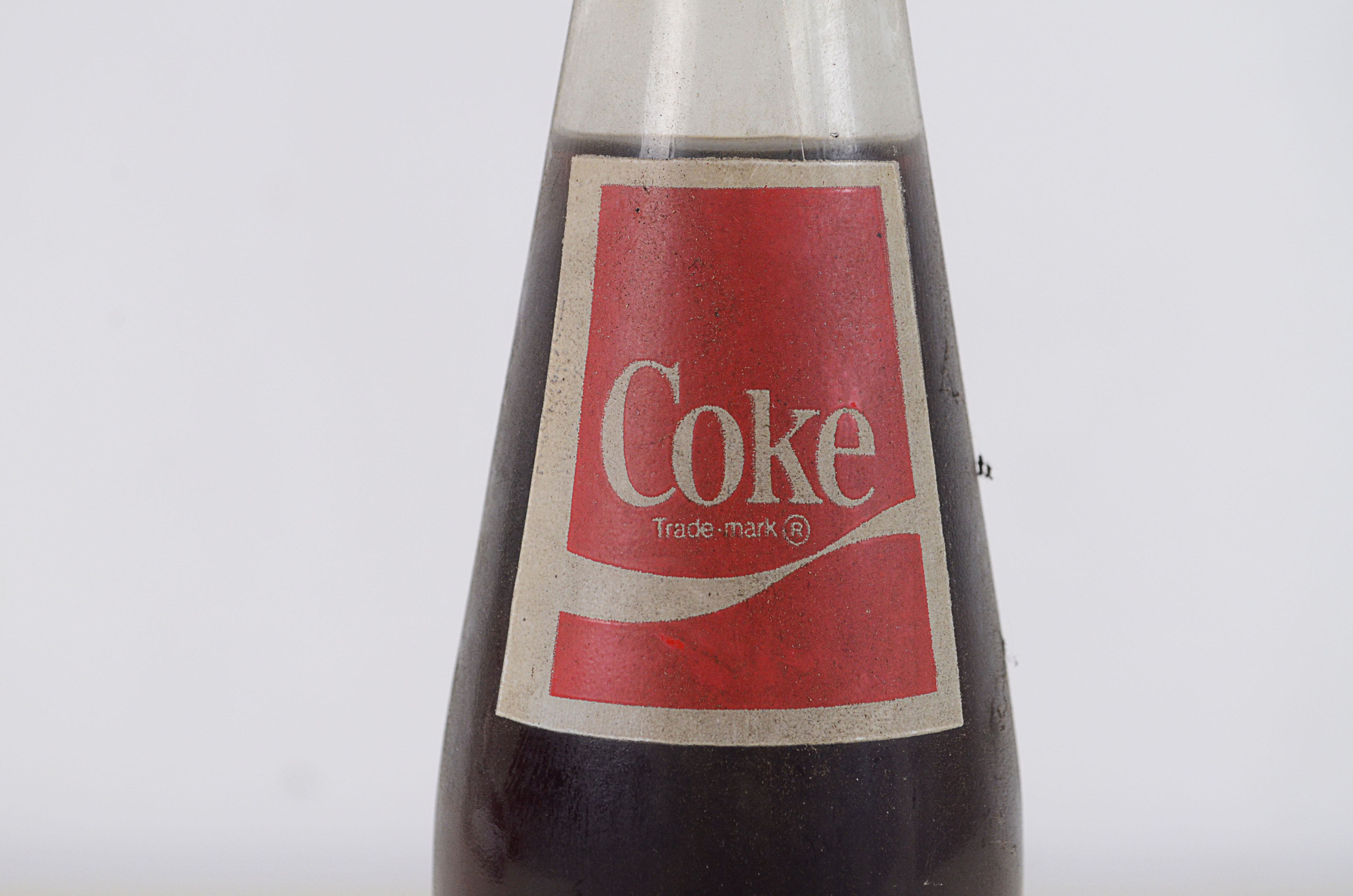Two Vintage Commemorative Coke Bottles